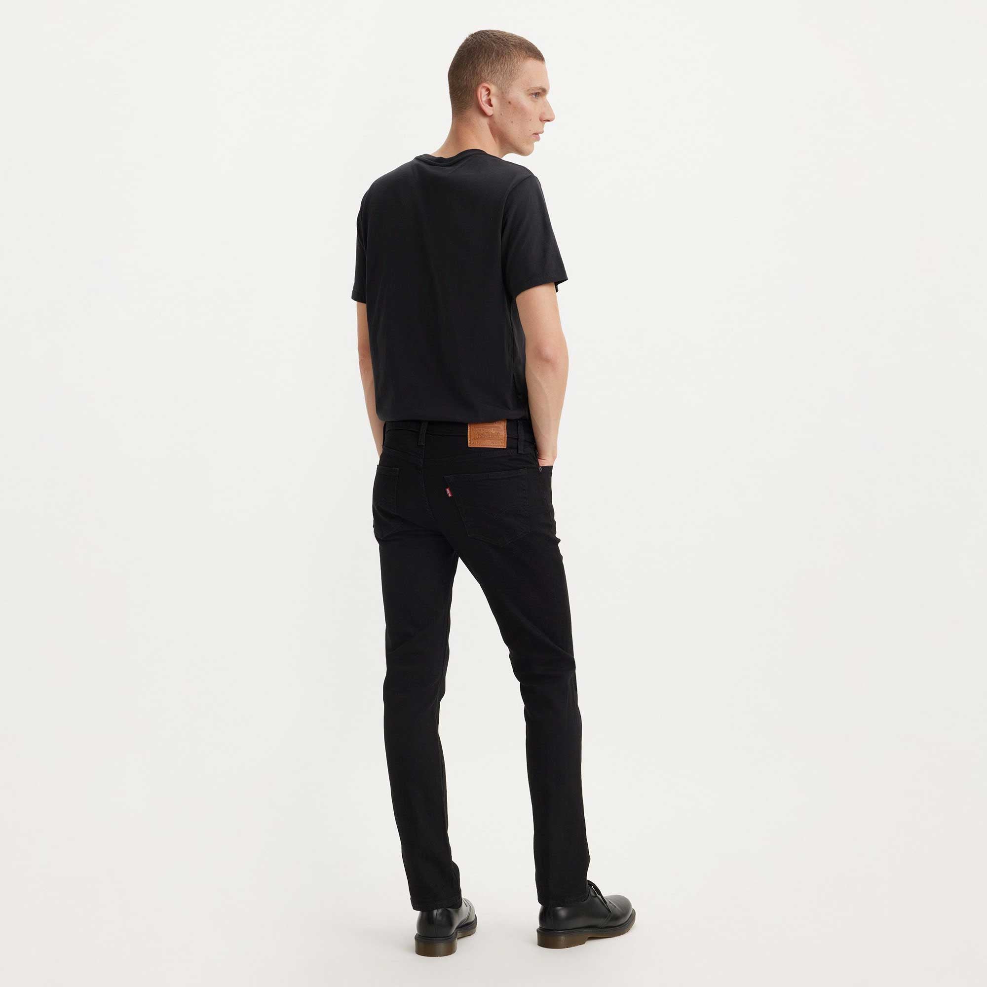 Levi's 511 Slim, black leaf adv — available at Norwood