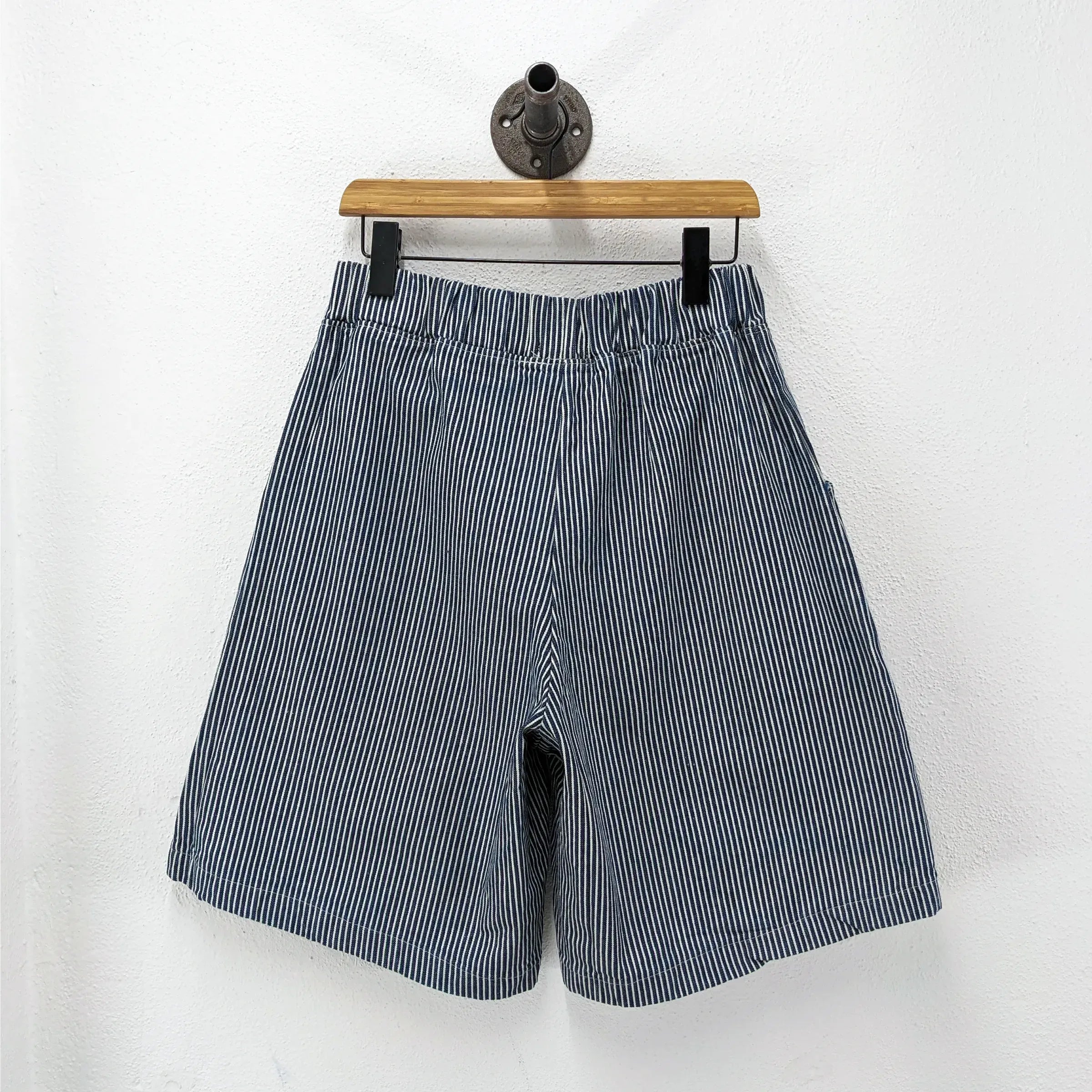 CUB Alia Long Shorts, indigo engineer stripe — available at Norwood