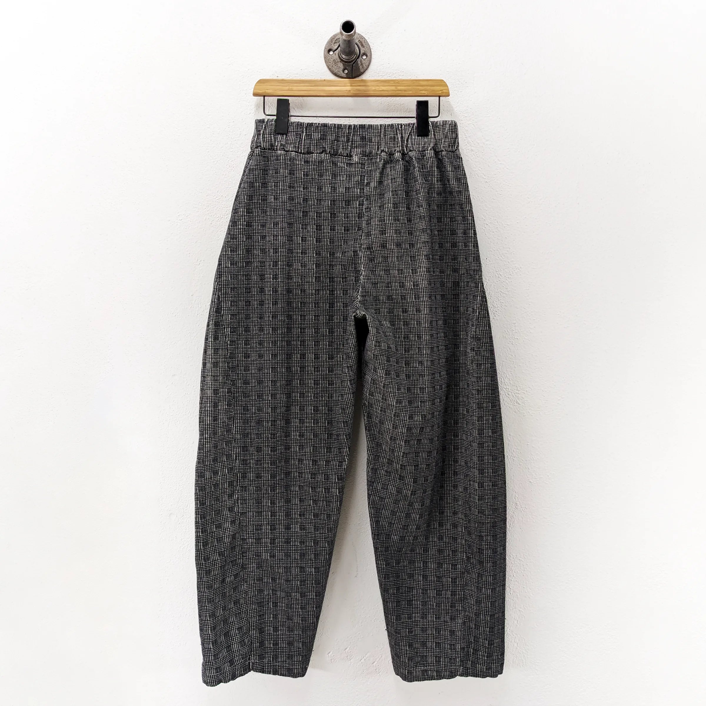 CUB Brett Pants, black plaid corduroy — available at Norwood