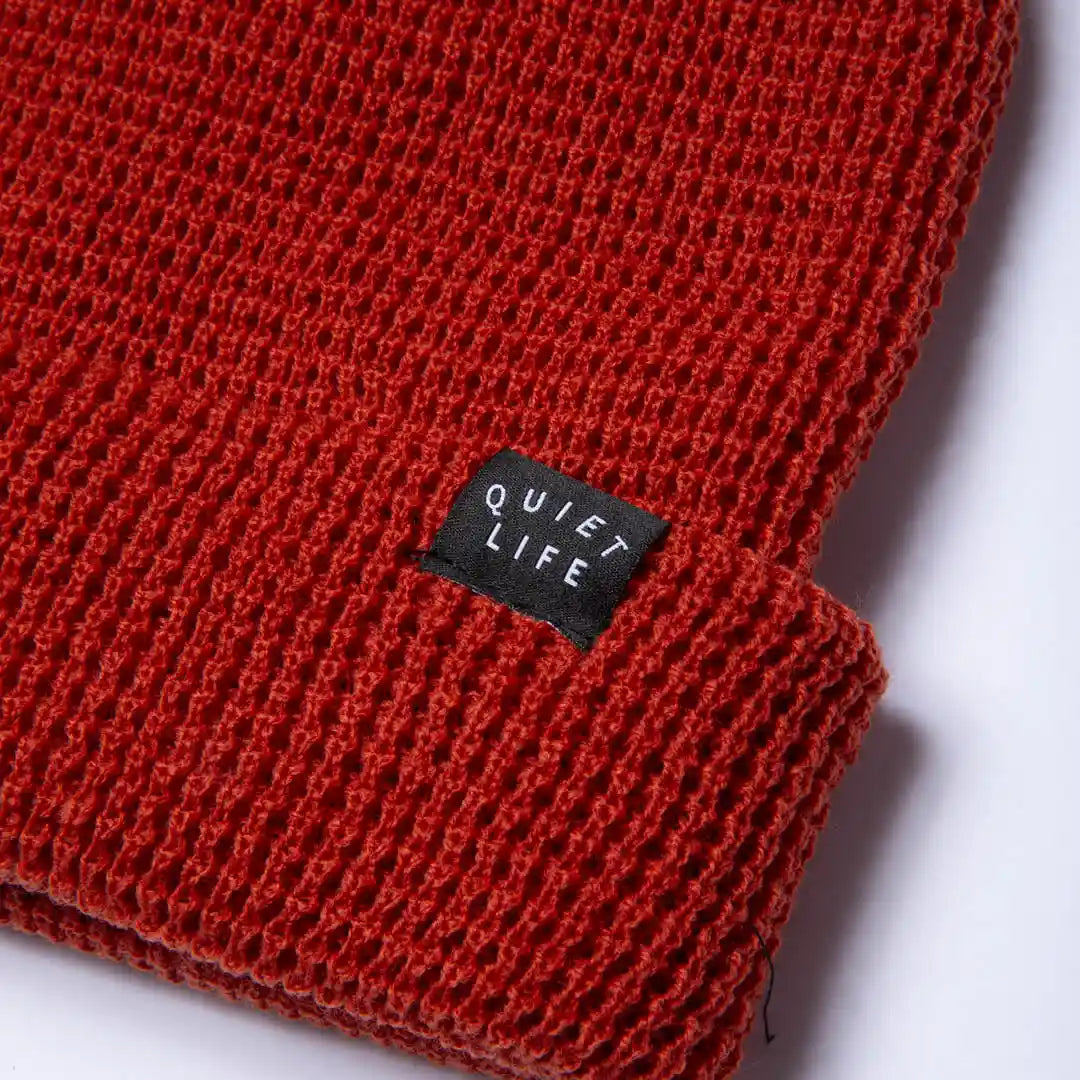 The Quiet Life Waffle Beanie, rust — available at Norwood