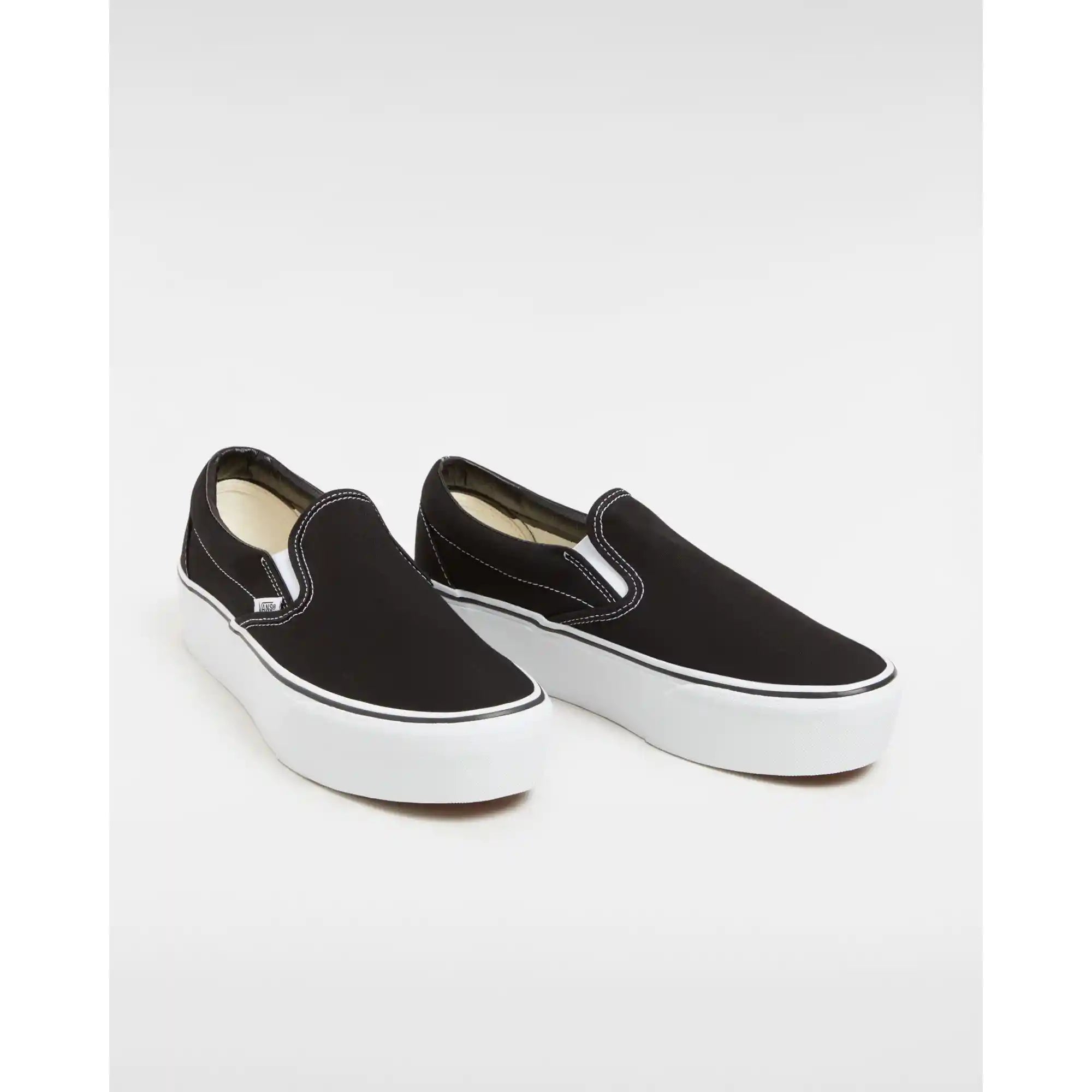 Vans Womens Classic Slip-On Stackform Shoes, canvas black/true white — available at Norwood