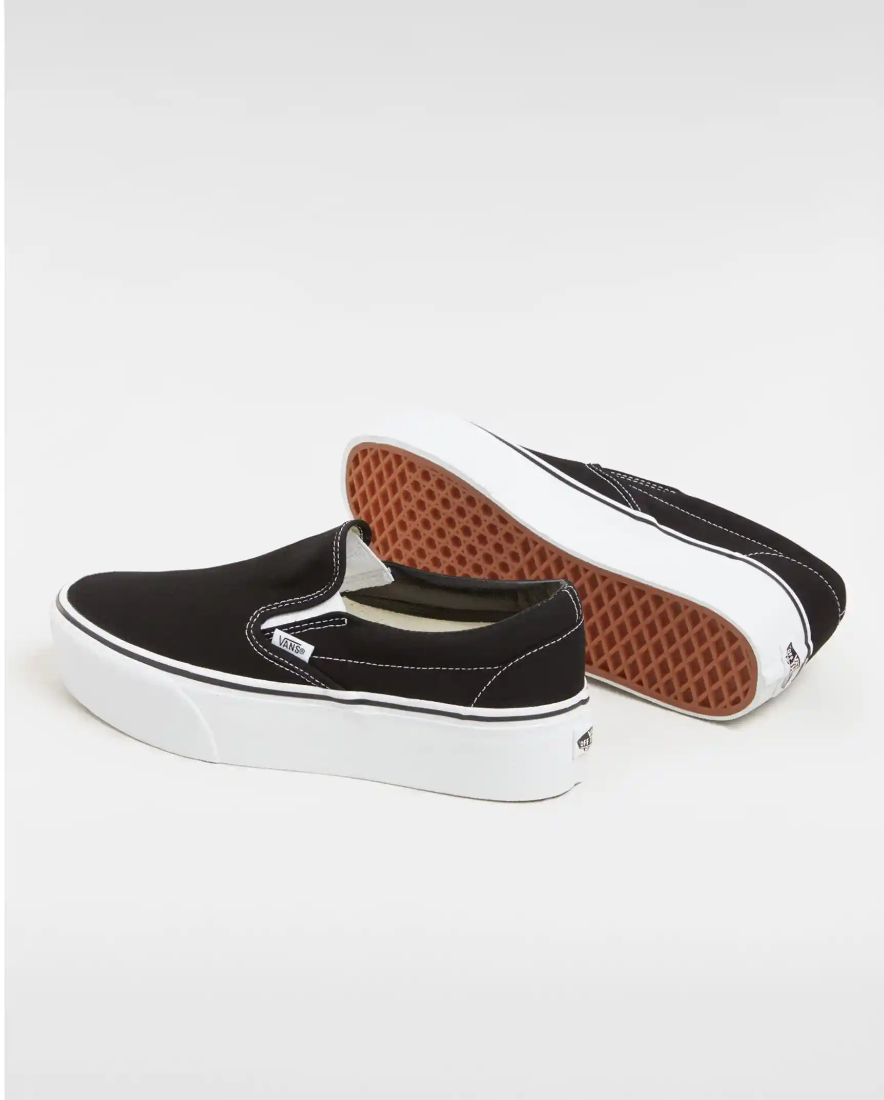 Vans Womens Classic Slip-On Stackform Shoes, canvas black/true white — available at Norwood