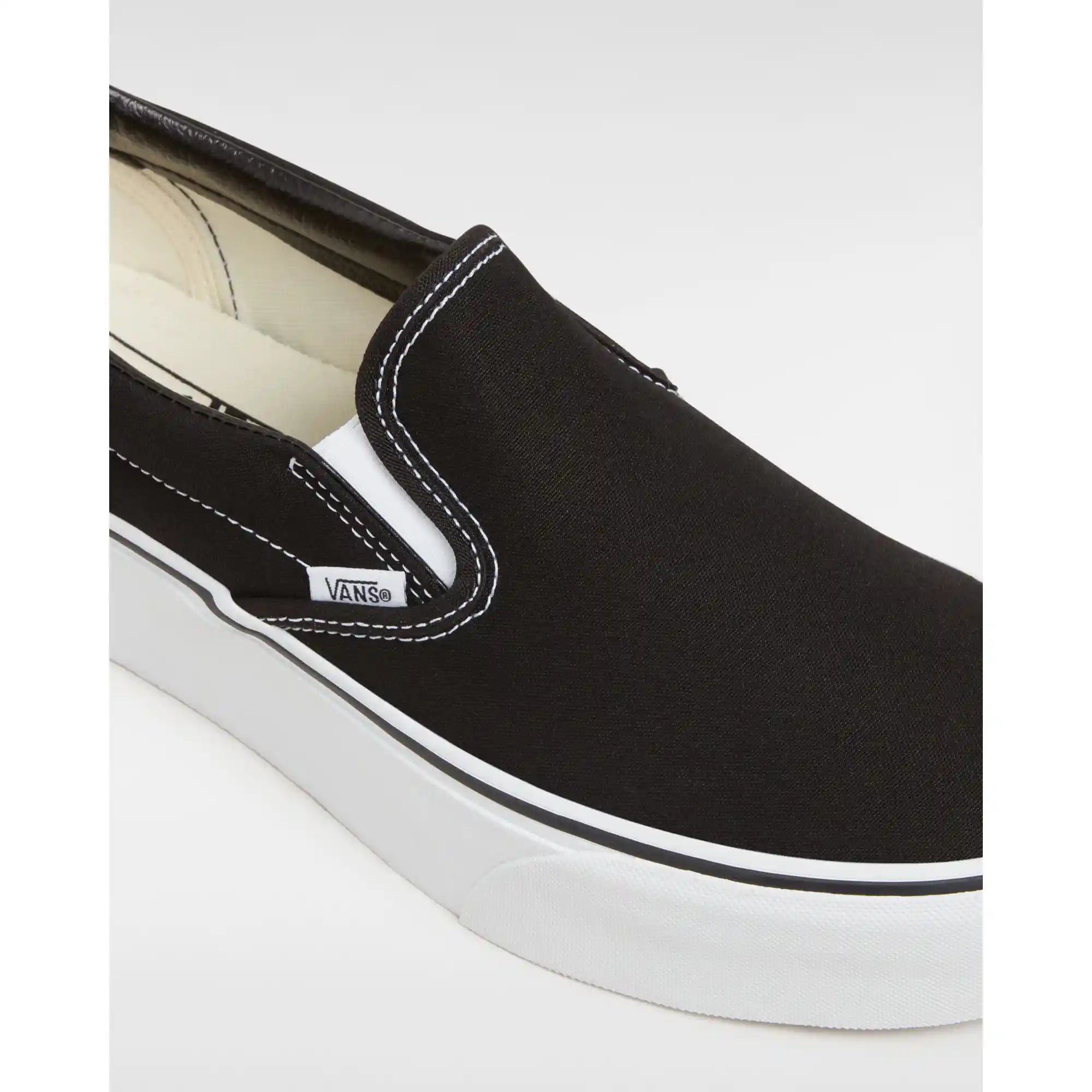Vans Womens Classic Slip-On Stackform Shoes, canvas black/true white — available at Norwood