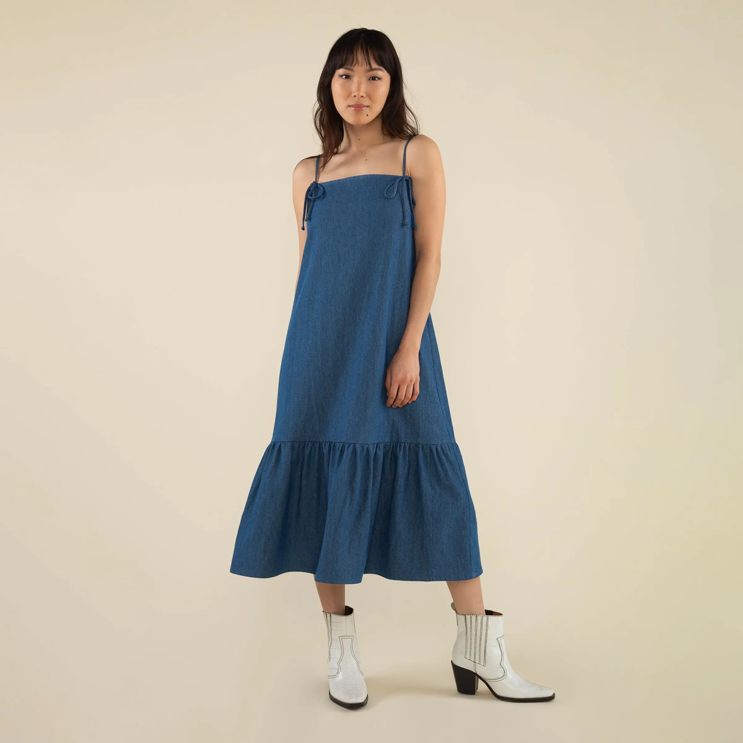 NLT Womens Bonnie Bow Denim Midi Dress, medium wash — available at Norwood