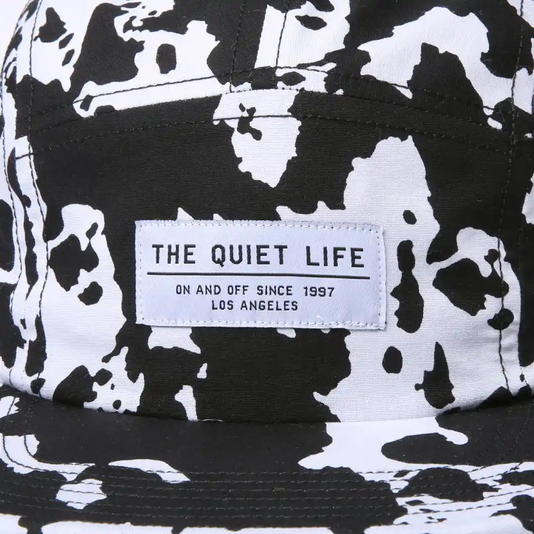 The Quiet Life Cow 5 Panel Camper Hat - Made In Usa, black/white — available at Norwood