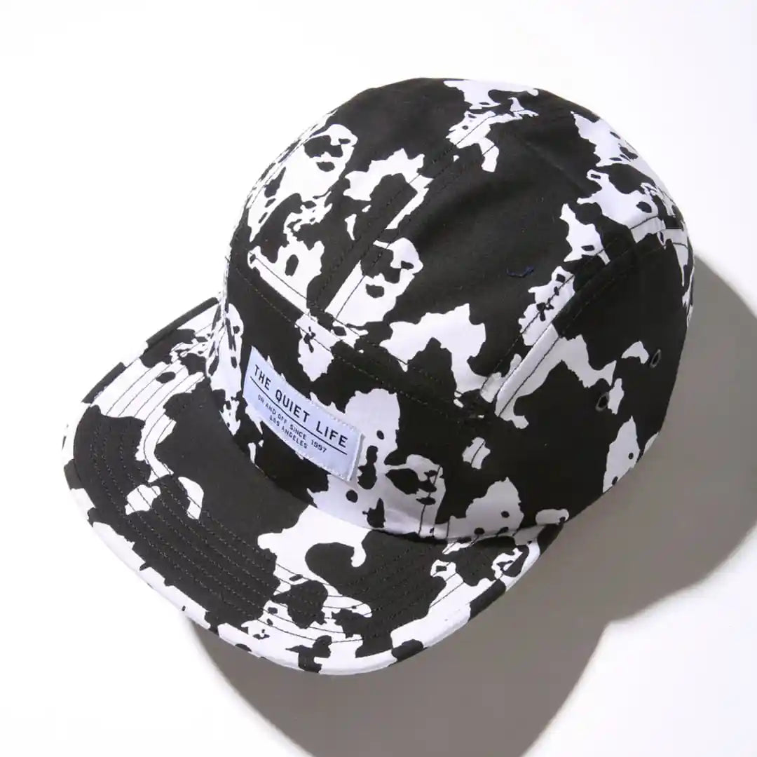 The Quiet Life Cow 5 Panel Camper Hat - Made In Usa, black/white — available at Norwood