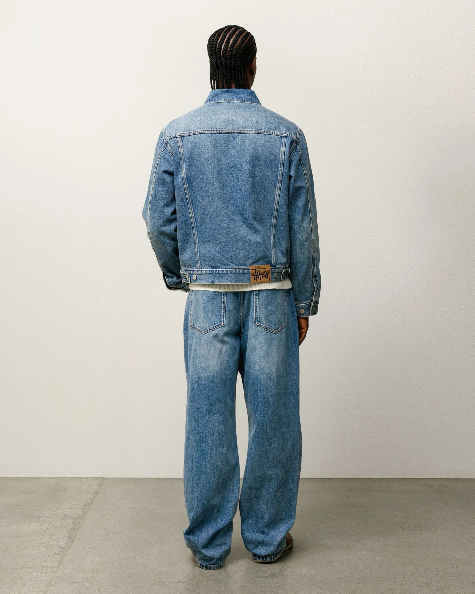 Stussy Lined Denim Trucker Jacket, indigo stone wash — available at Norwood