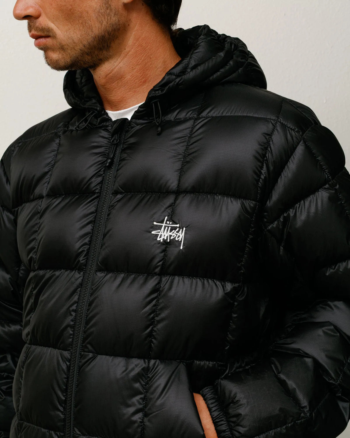 Stussy Midweight Hooded Puffer, black — available at Norwood