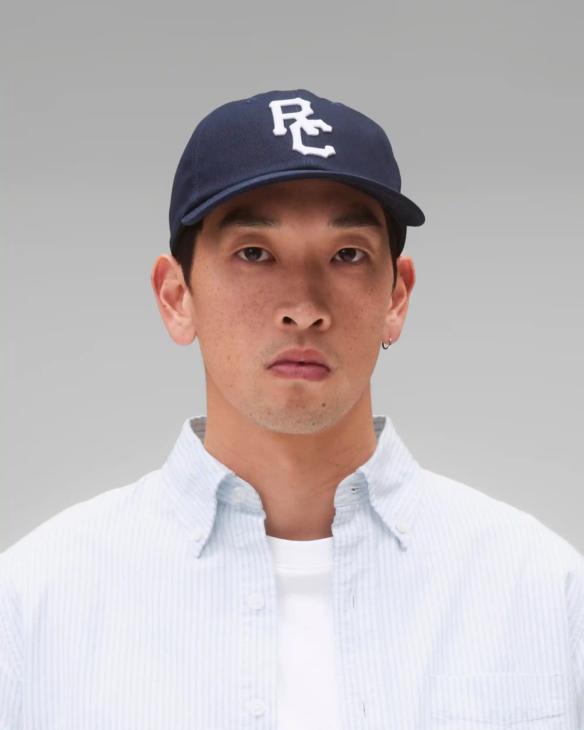 Reigning Champ Outfield Strapback Cap — available at Norwood