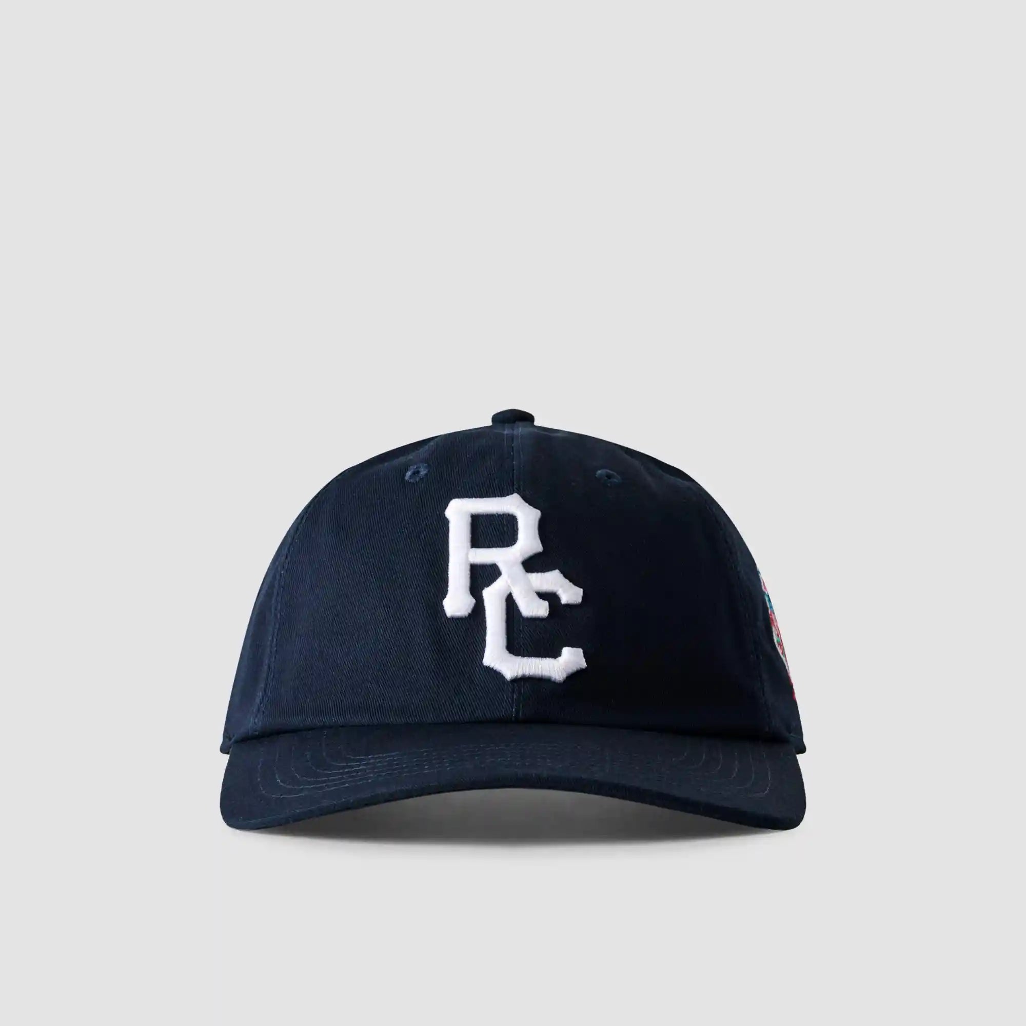 Reigning Champ Outfield Strapback Cap — available at Norwood