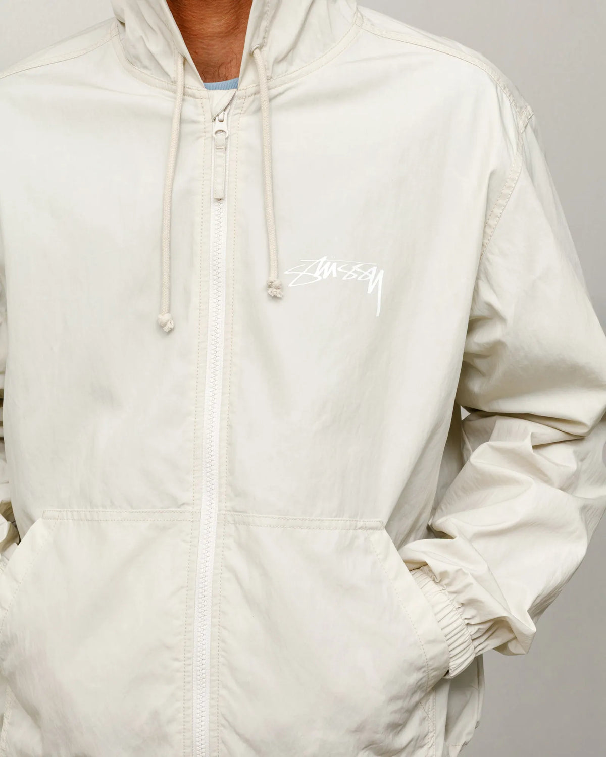 Stussy Waxed Cotton Beach Shell, stone — available at Norwood