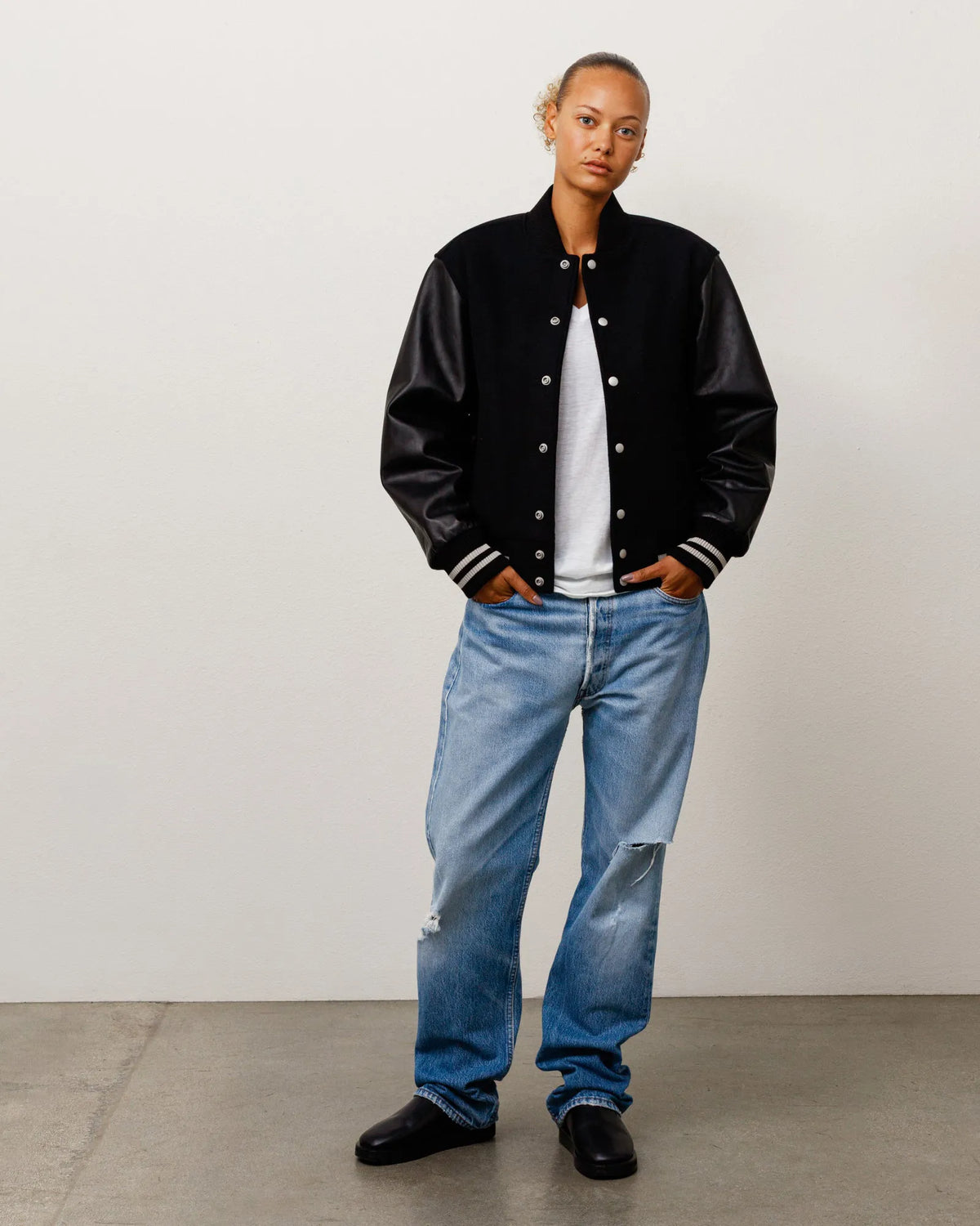 Stussy Wool Varsity, black — available at Norwood