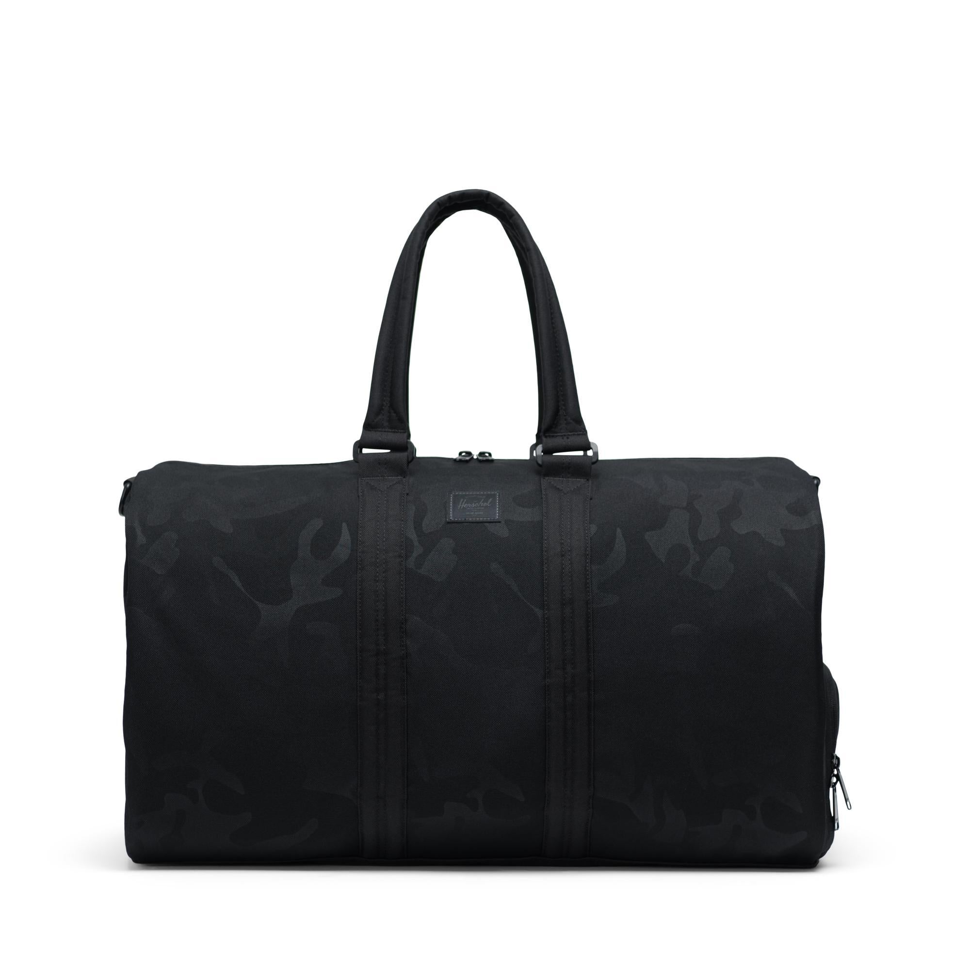 Herschel Delta Novel duffle - black/tonal camo — available at Norwood
