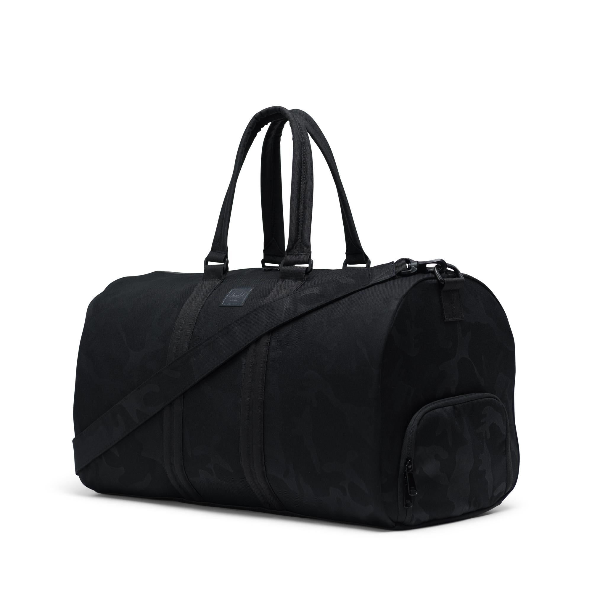Herschel Delta Novel duffle - black/tonal camo — available at Norwood