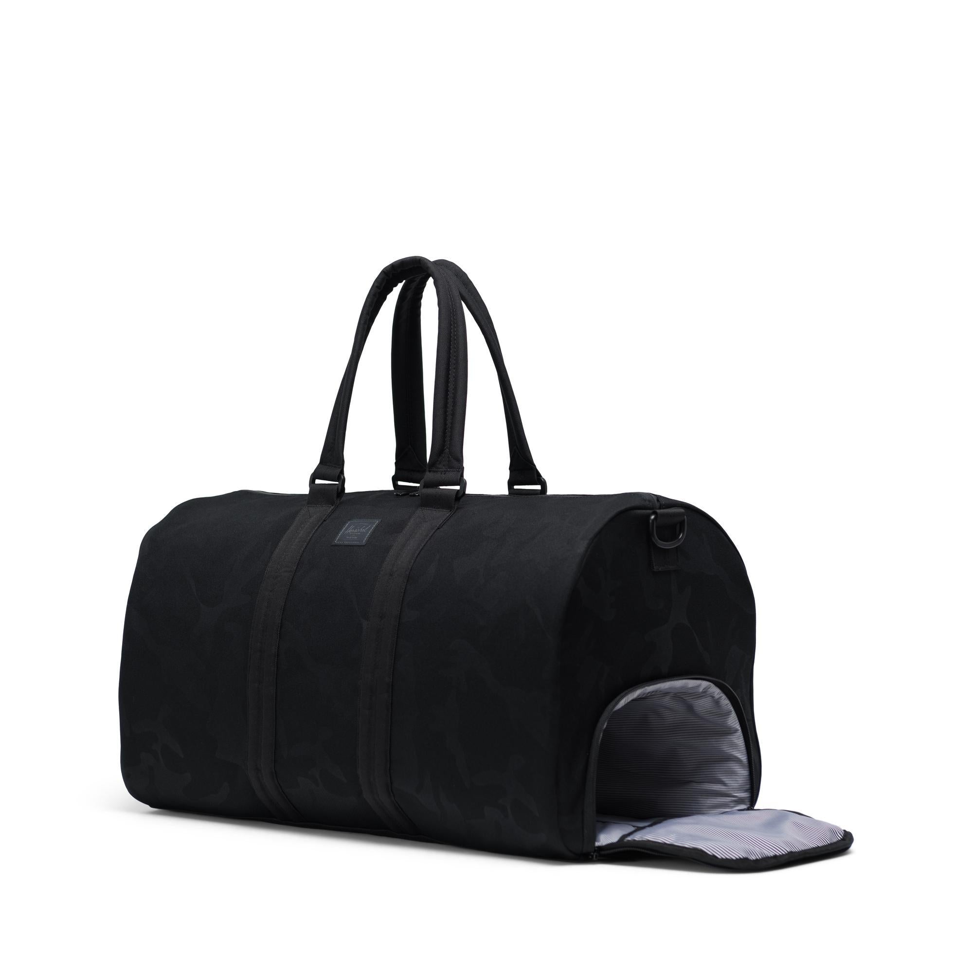 Herschel Delta Novel duffle - black/tonal camo — available at Norwood