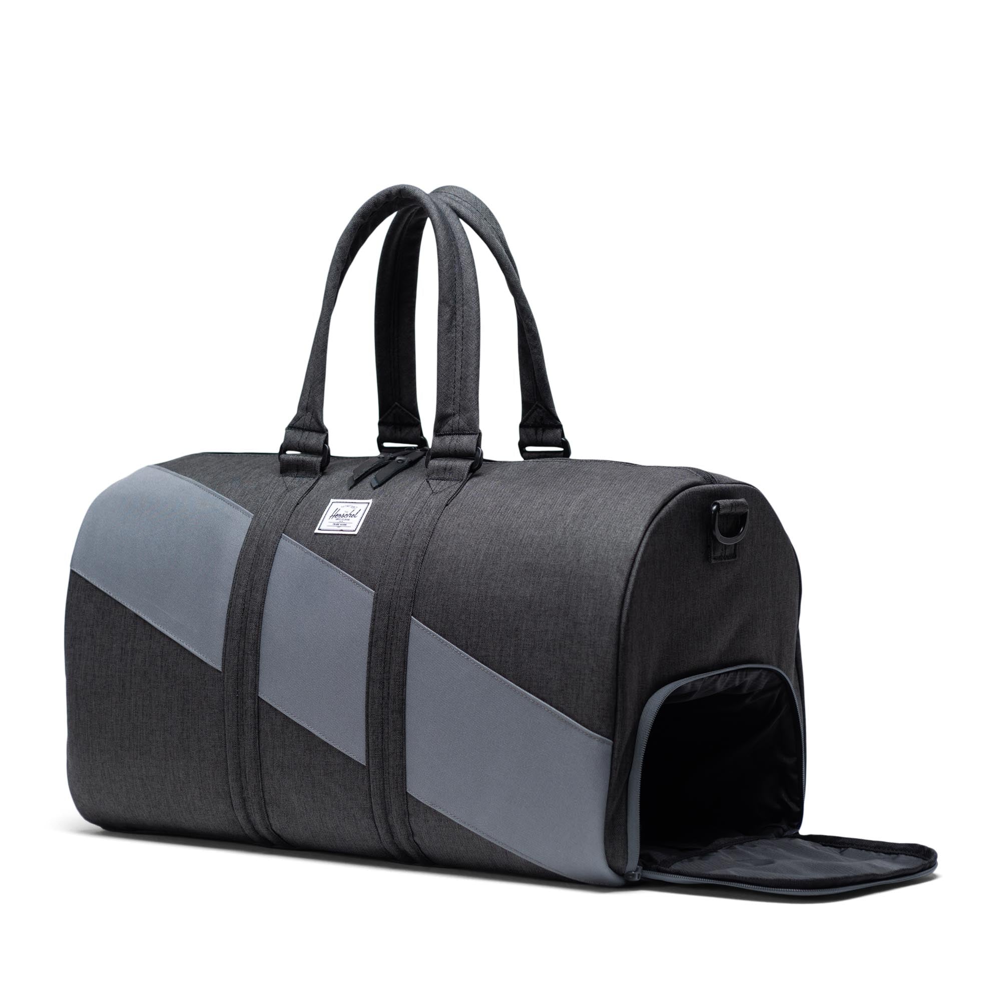Herschel Novel Duffel Bag, Black Crosshatch/Quiet Shade/Periscope — available at Norwood