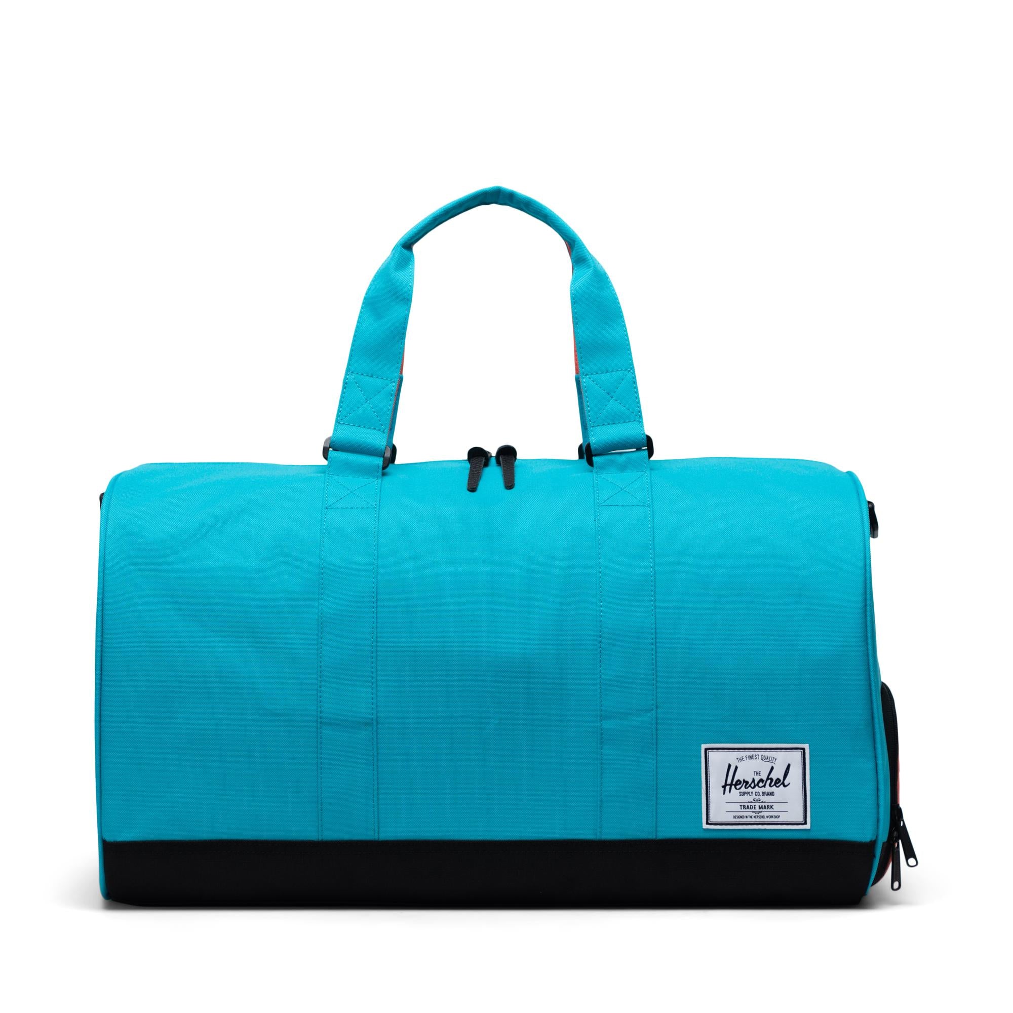 Herschel Novel Duffle, blue bird/black/emberglow — available at Norwood