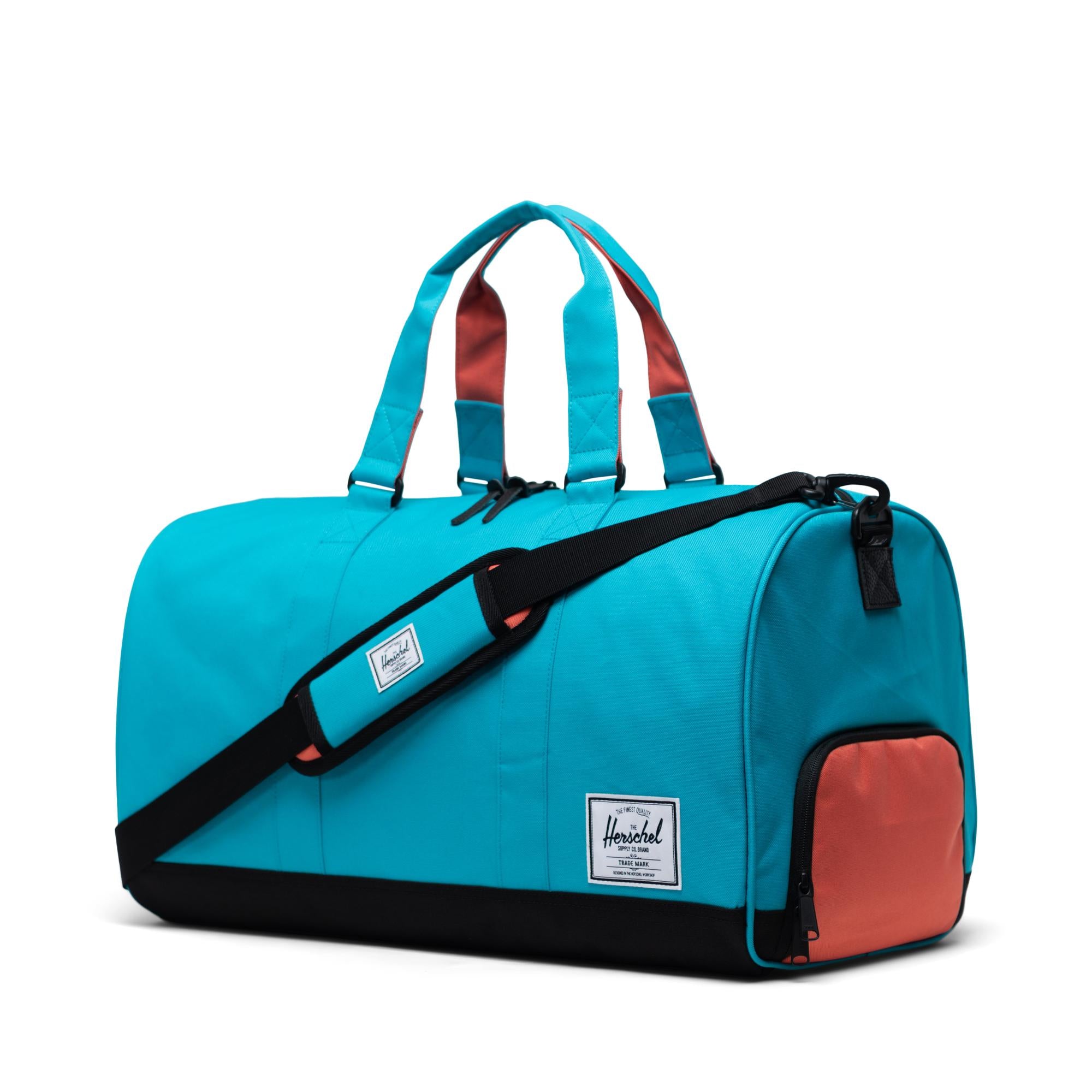 Herschel Novel Duffle, blue bird/black/emberglow — available at Norwood