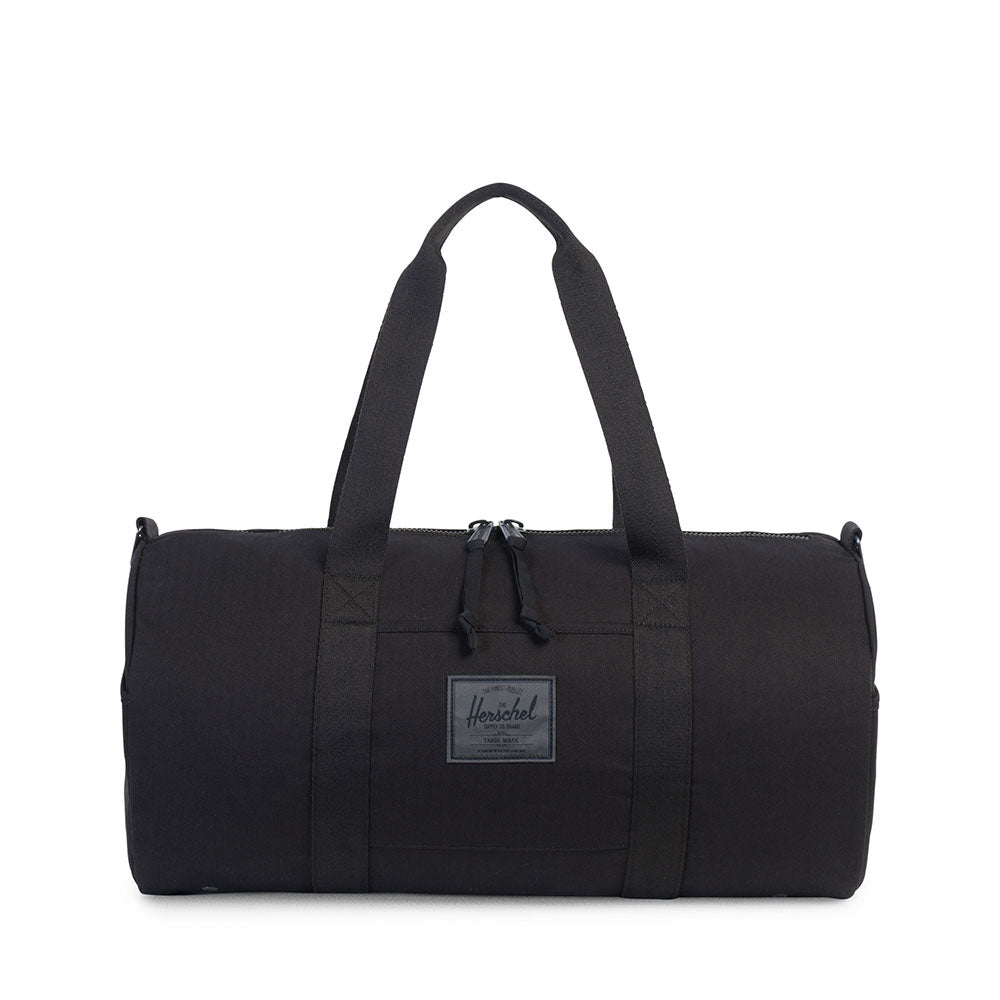 Herschel Sutton Mid Bag, Cotton Twill Black Surplus — available at Norwood