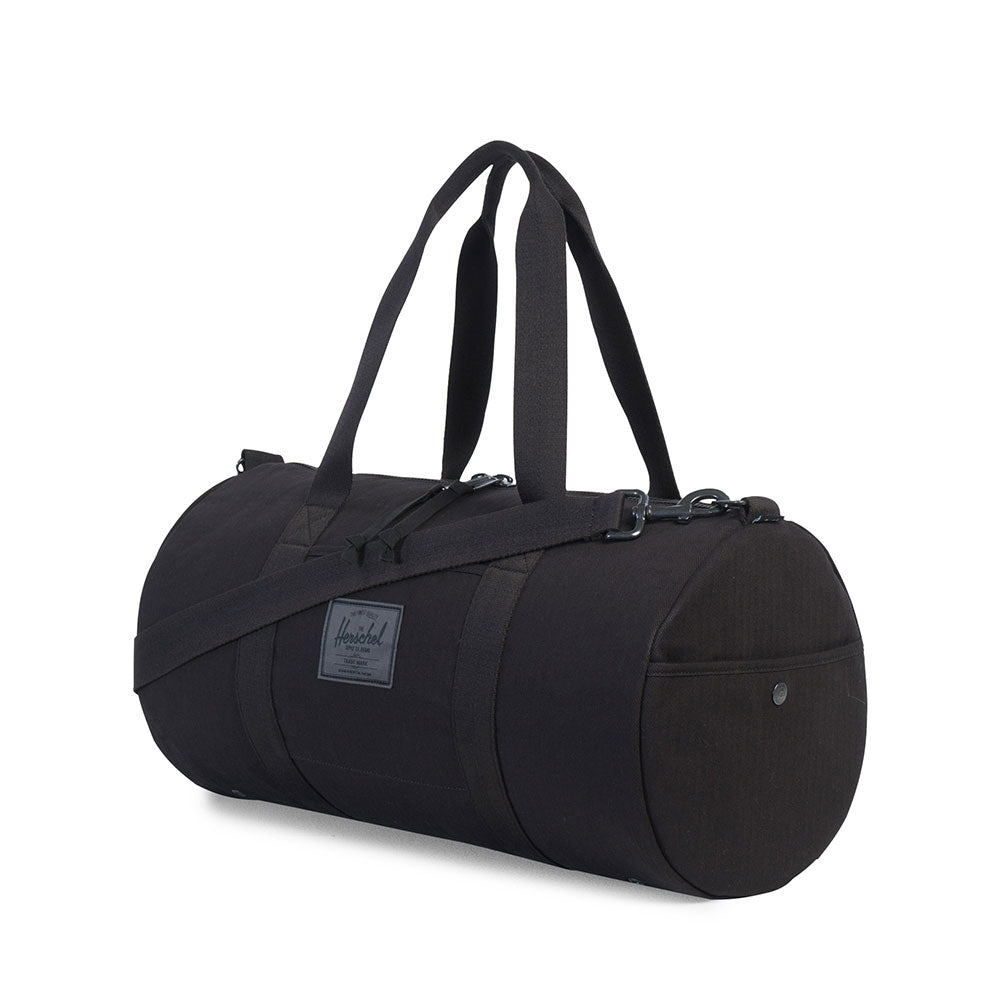 Herschel Sutton Mid Bag, Cotton Twill Black Surplus — available at Norwood
