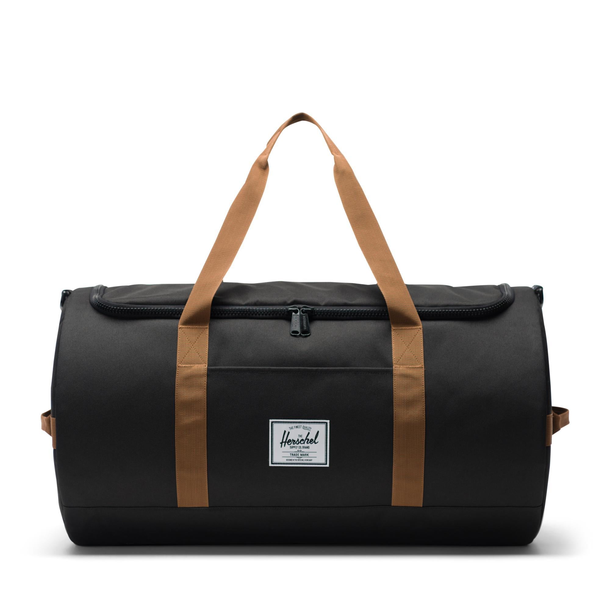 Herschel Sutton duffle, Black/Saddle Brown — available at Norwood