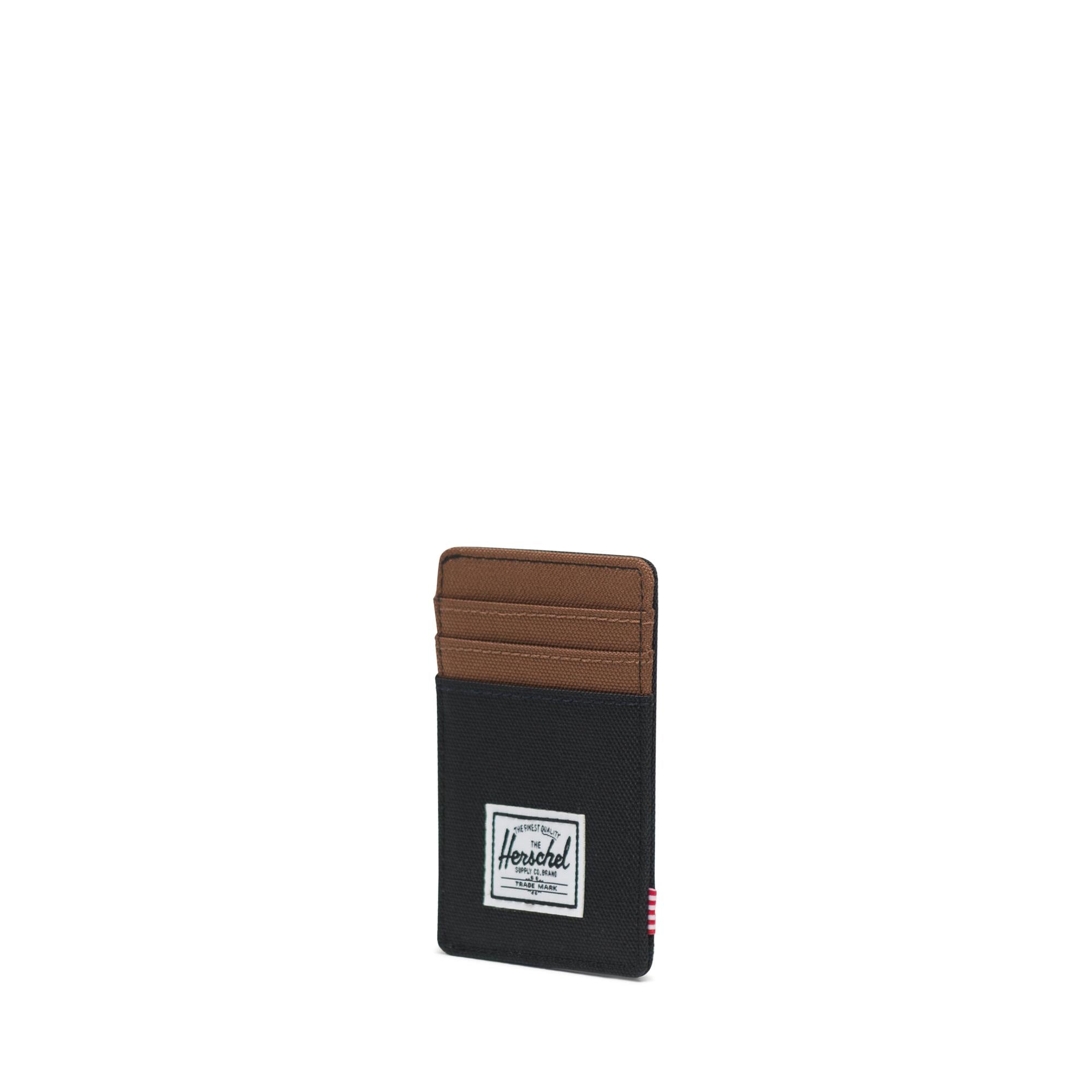 Herschel Raven wallet, black/saddle brown — available at Norwood
