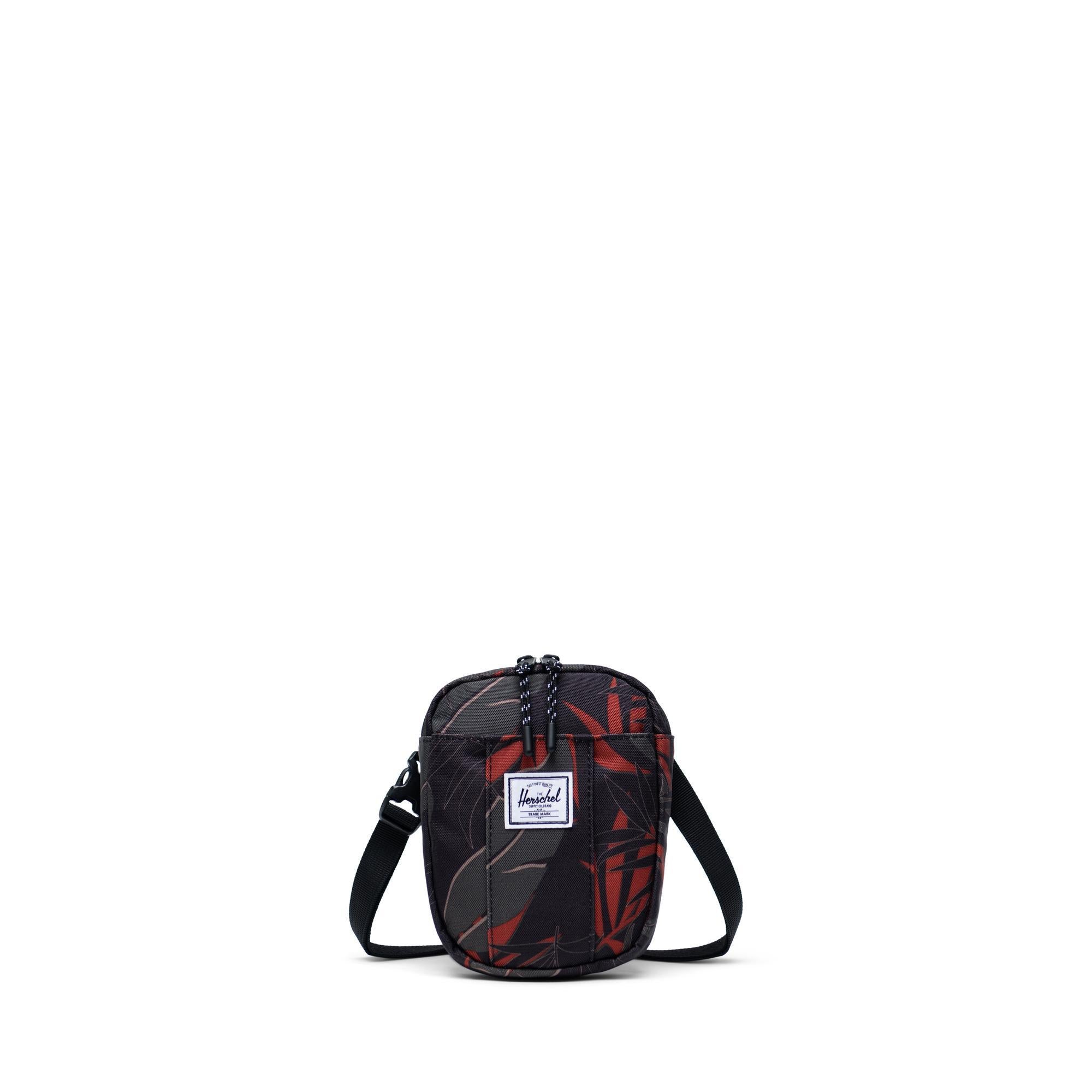 Herschel Cruz crossbody bag, dark olive/plum — available at Norwood