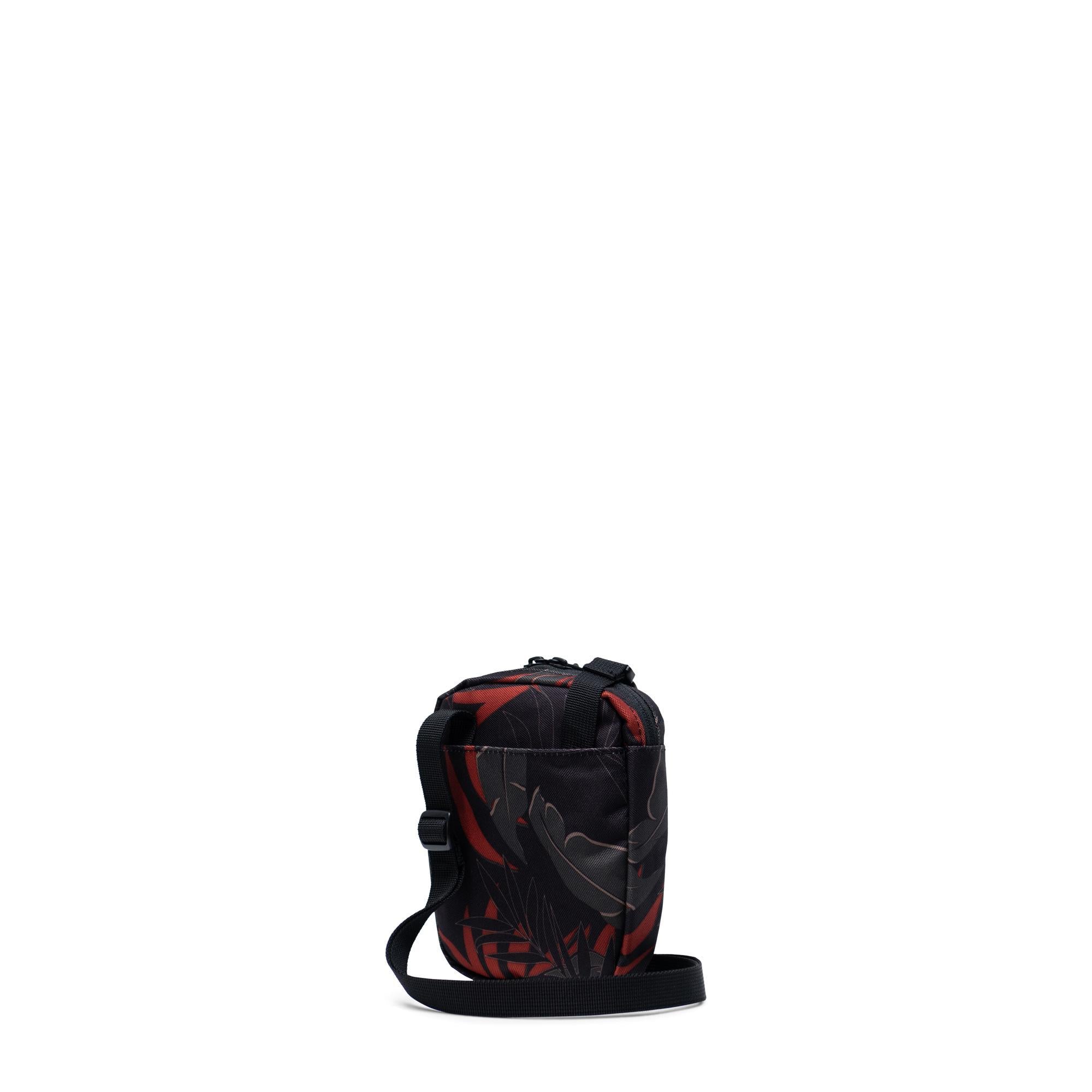 Herschel Cruz crossbody bag, dark olive/plum — available at Norwood