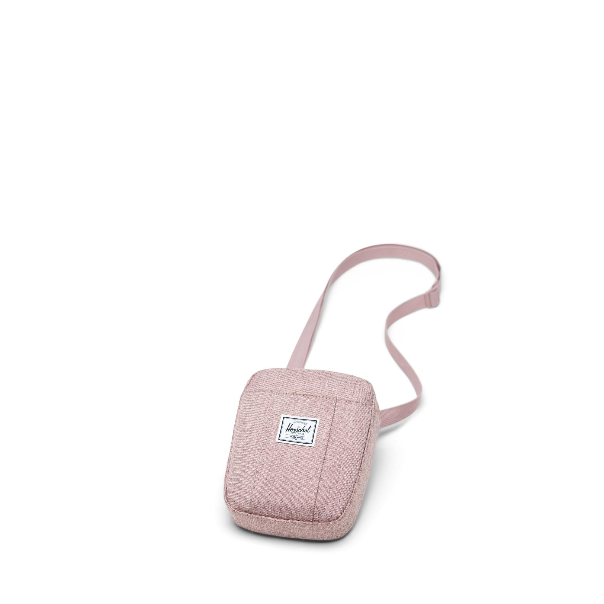 Herschel Cruz Crossbody, ash rose crosshatch — available at Norwood