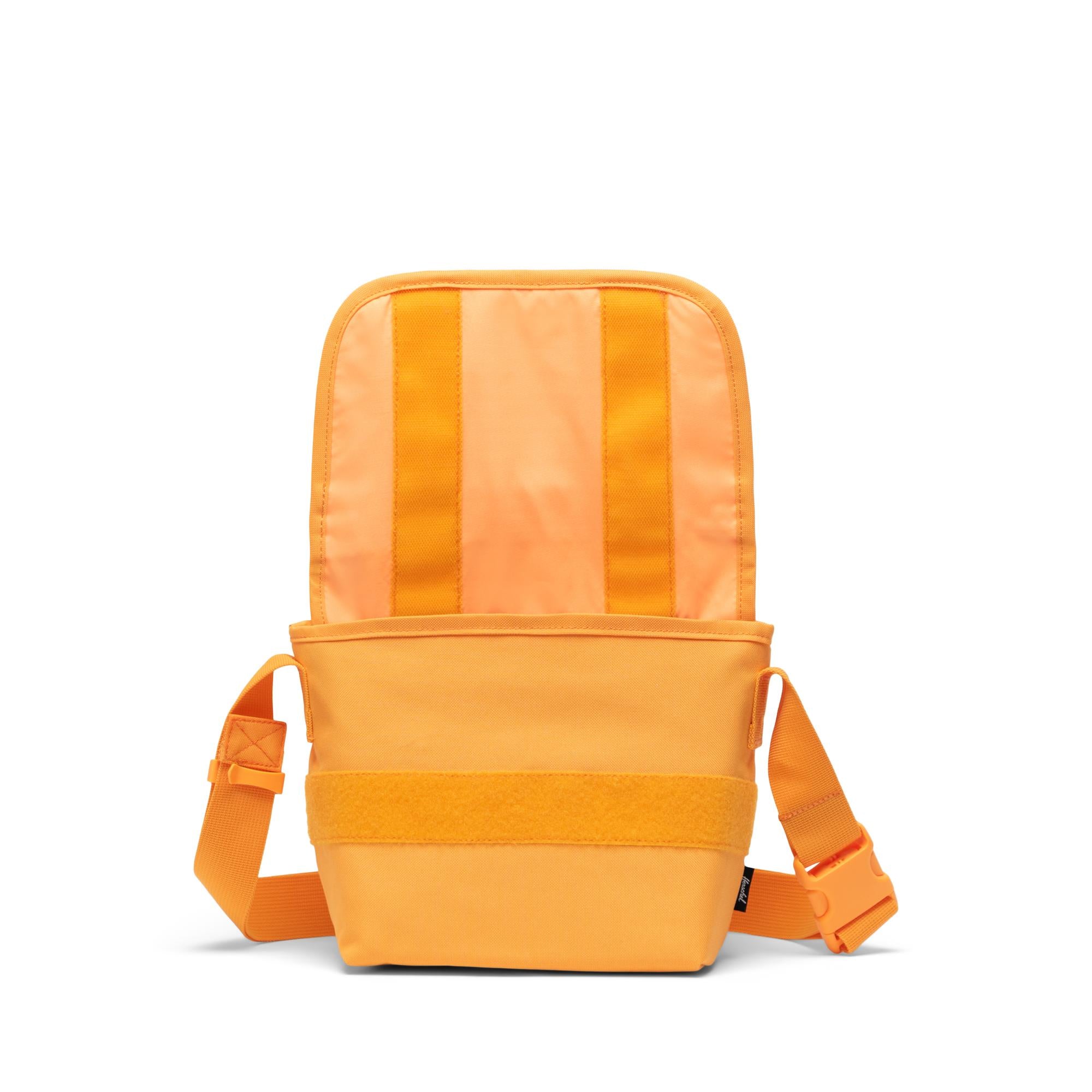 Herschel Grade Mini Crossbody, blazing orange — available at Norwood