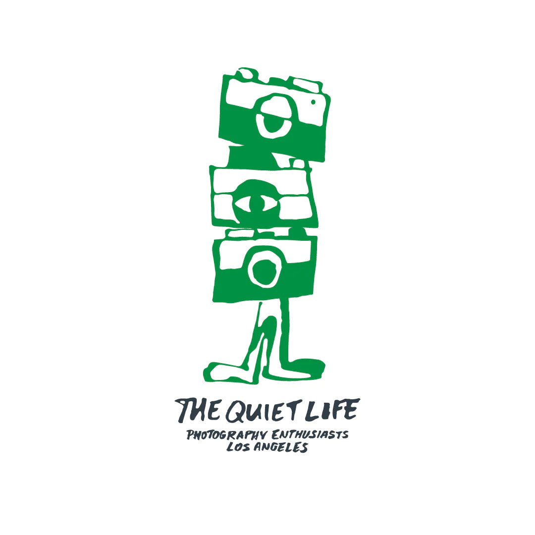 The Quiet Life Camera Club Crew Premium T — available at Norwood