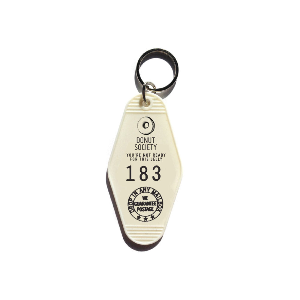 Three Potato Four Donut Society keychain - white — available at Norwood