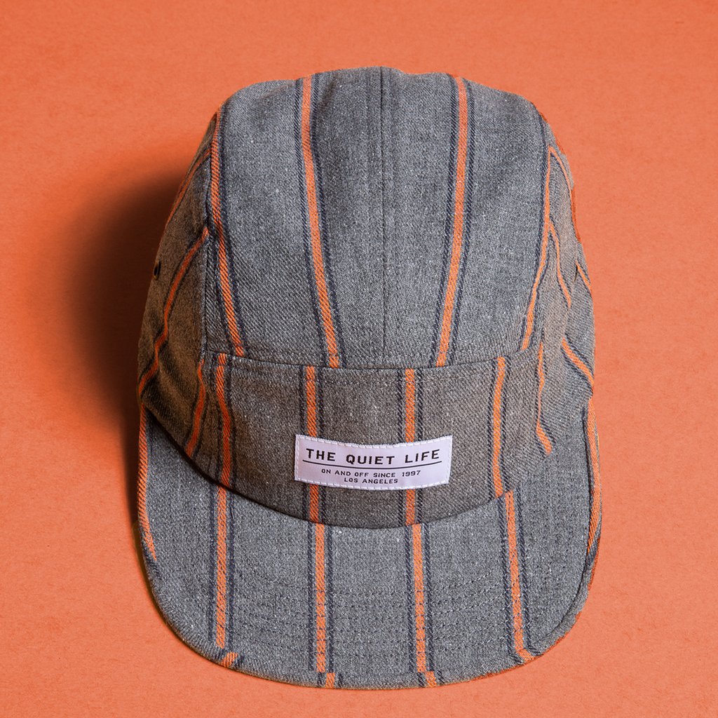 Quiet Life Striped Flannel 5 panel hat, grey/orange — available at Norwood