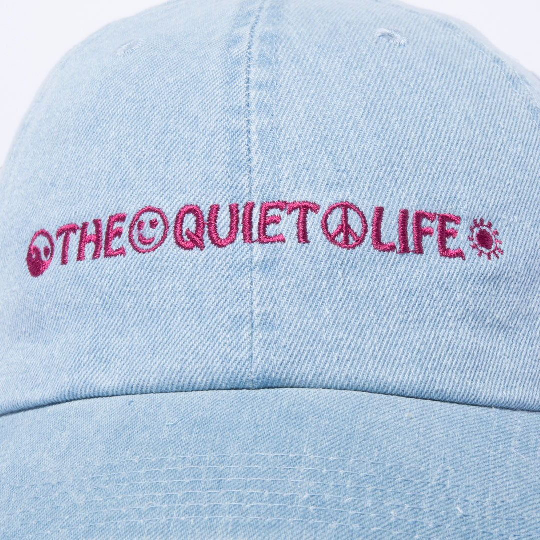 The Quiet Life Symbols Dad Hat, light denim — available at Norwood
