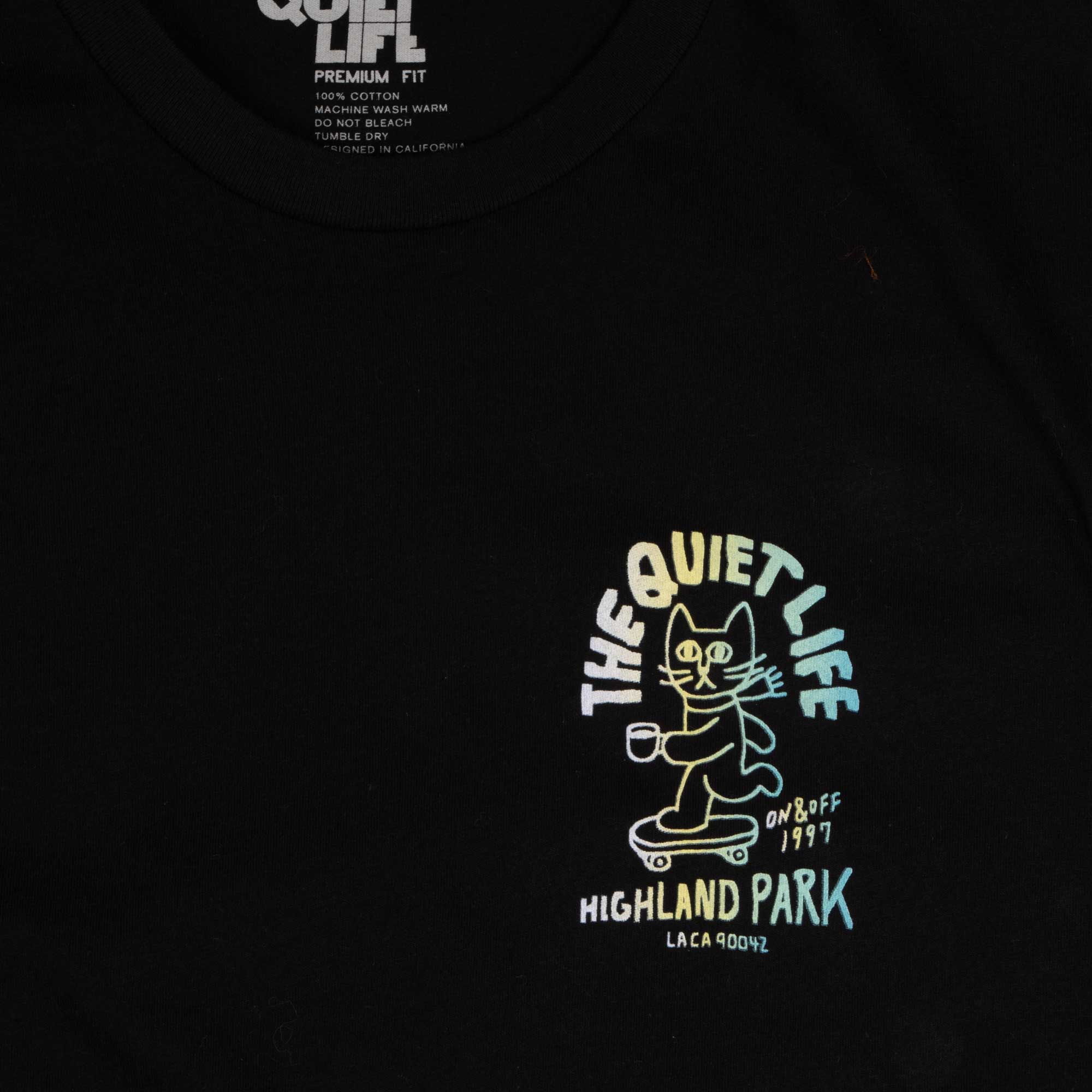 The Quiet Life Skating Cat Premium Shop T — available at Norwood