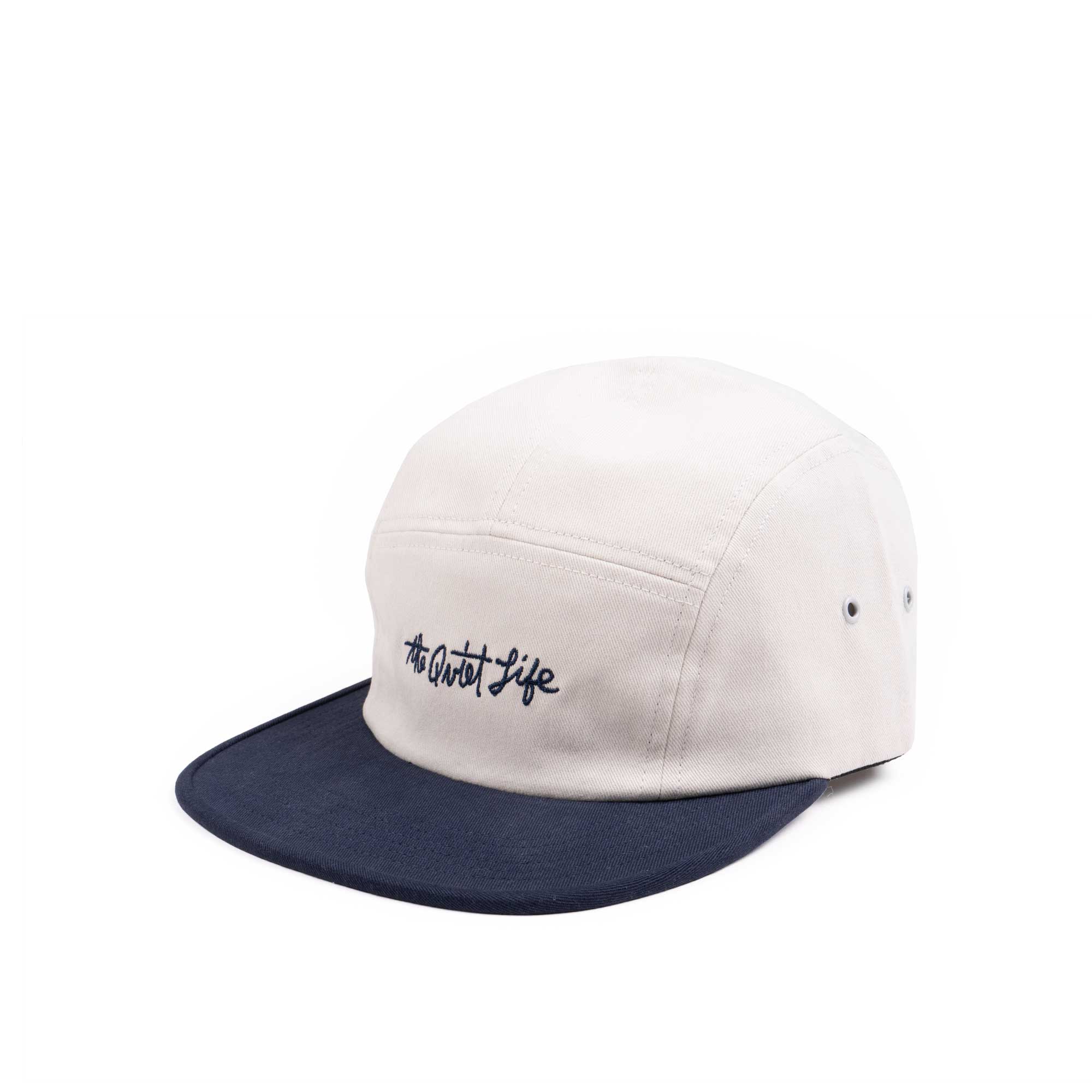 The Quiet Life Horizon Script 5 Panel Camper Hat, stone/navy — available at Norwood