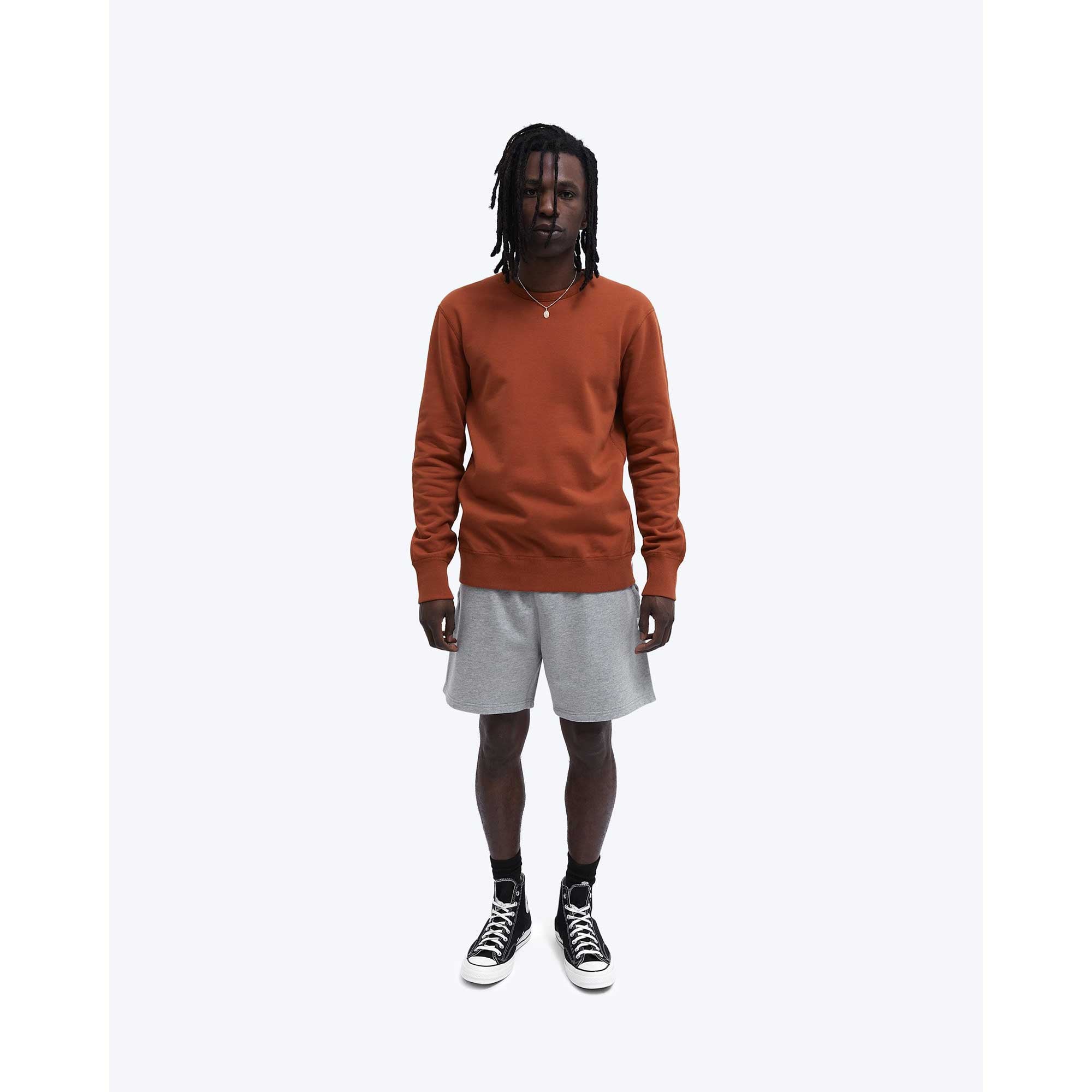Reigning Champ Midweight Terry Crewneck — available at Norwood
