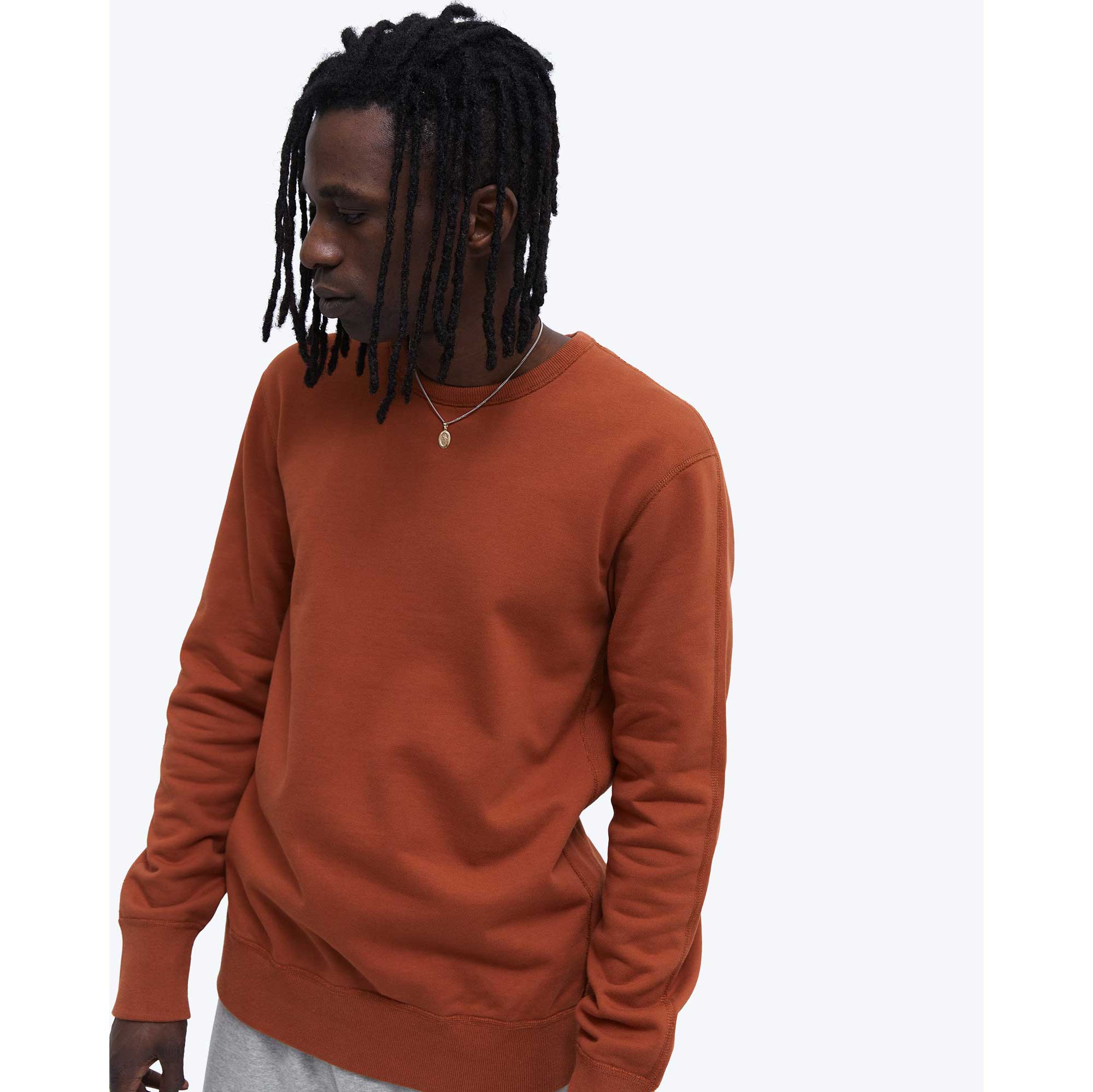 Reigning Champ Midweight Terry Crewneck — available at Norwood