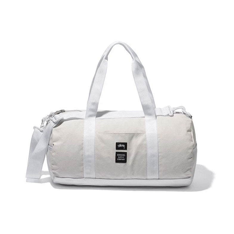 Stussy x Herschel Supply heavy canvas duffle — available at Norwood