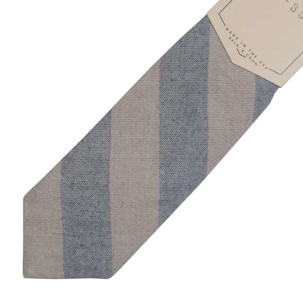 The Hill-side Natural Warp Border Stripe pointed tie, navy/khaki awning — available at Norwood