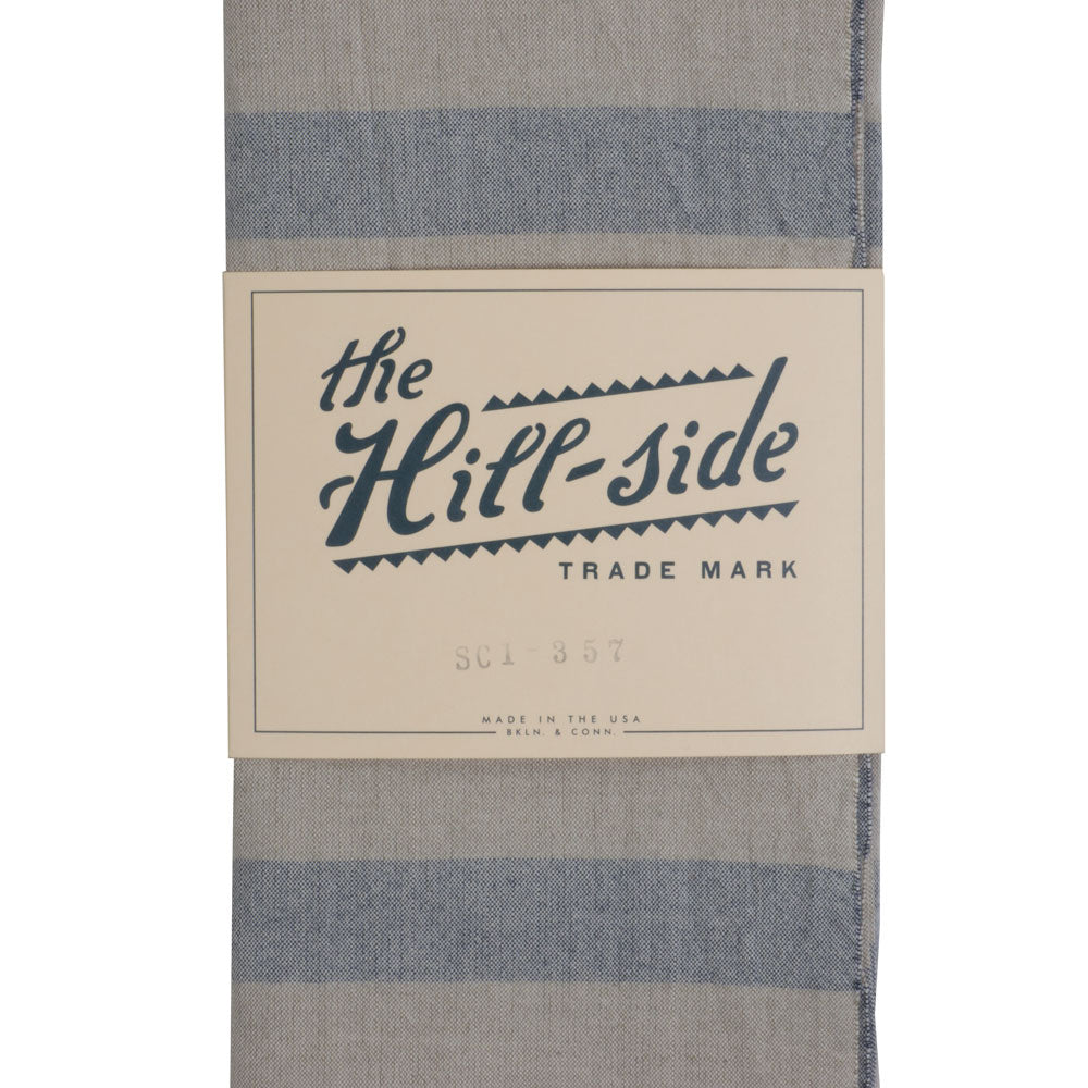 The Hill-side Natural Warp Border Stripe scarf, navy/khaki awning — available at Norwood