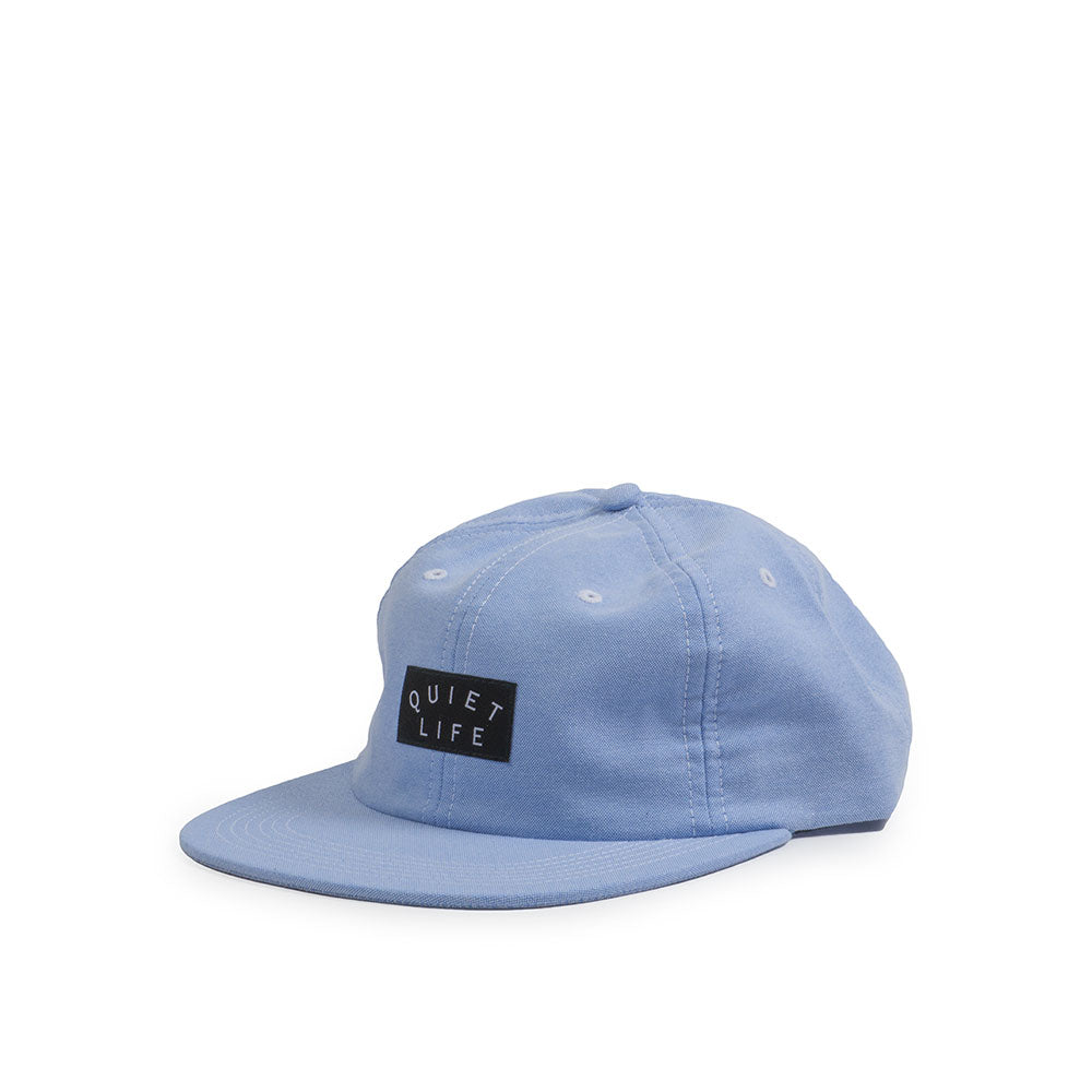 Quiet Life Oxford polo hat — available at Norwood