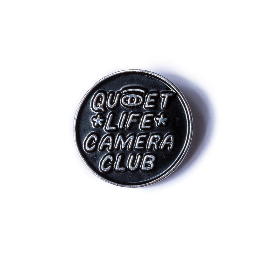 Quiet Life Camera Eye Lapel Pin — available at Norwood