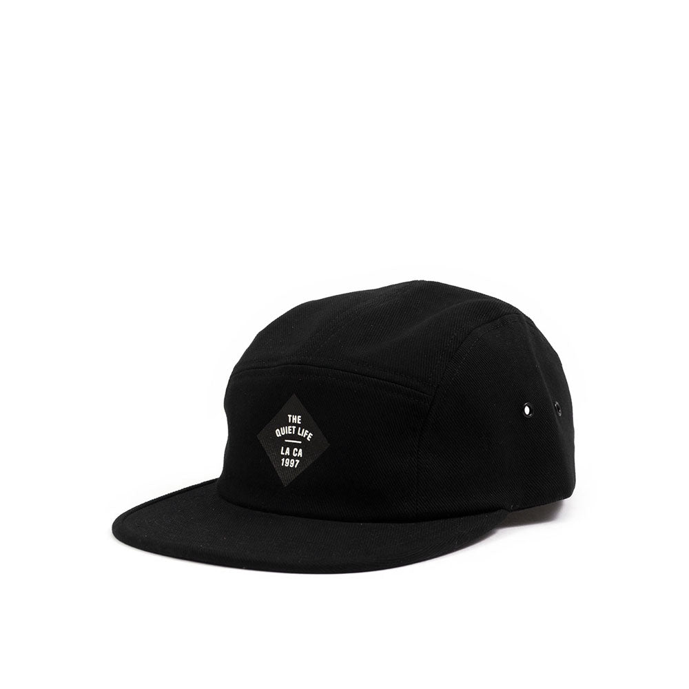 Quiet Life Traveler 5 panel hat, black — available at Norwood