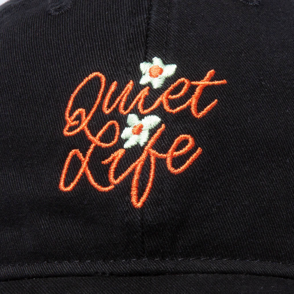 The Quiet Life Florist Dad Hat, black — available at Norwood