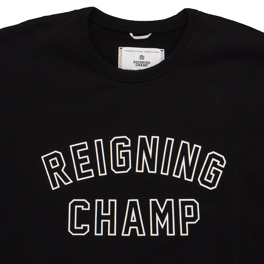 Reigning Champ Midweight Terry Varsity Crewneck — available at Norwood