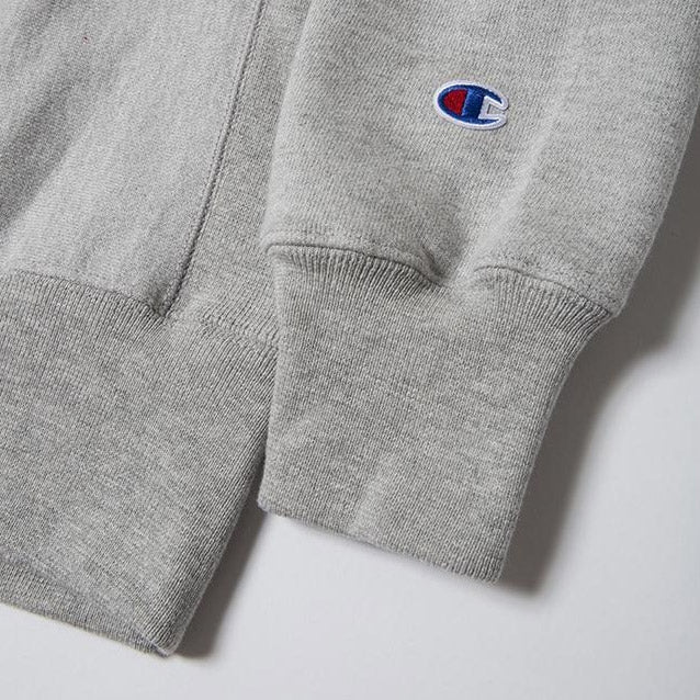 Quiet Life Champ Reverse Weave crew — available at Norwood