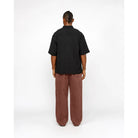 Stussy Flat Bottom Crinkled Shirt, black — available at Norwood