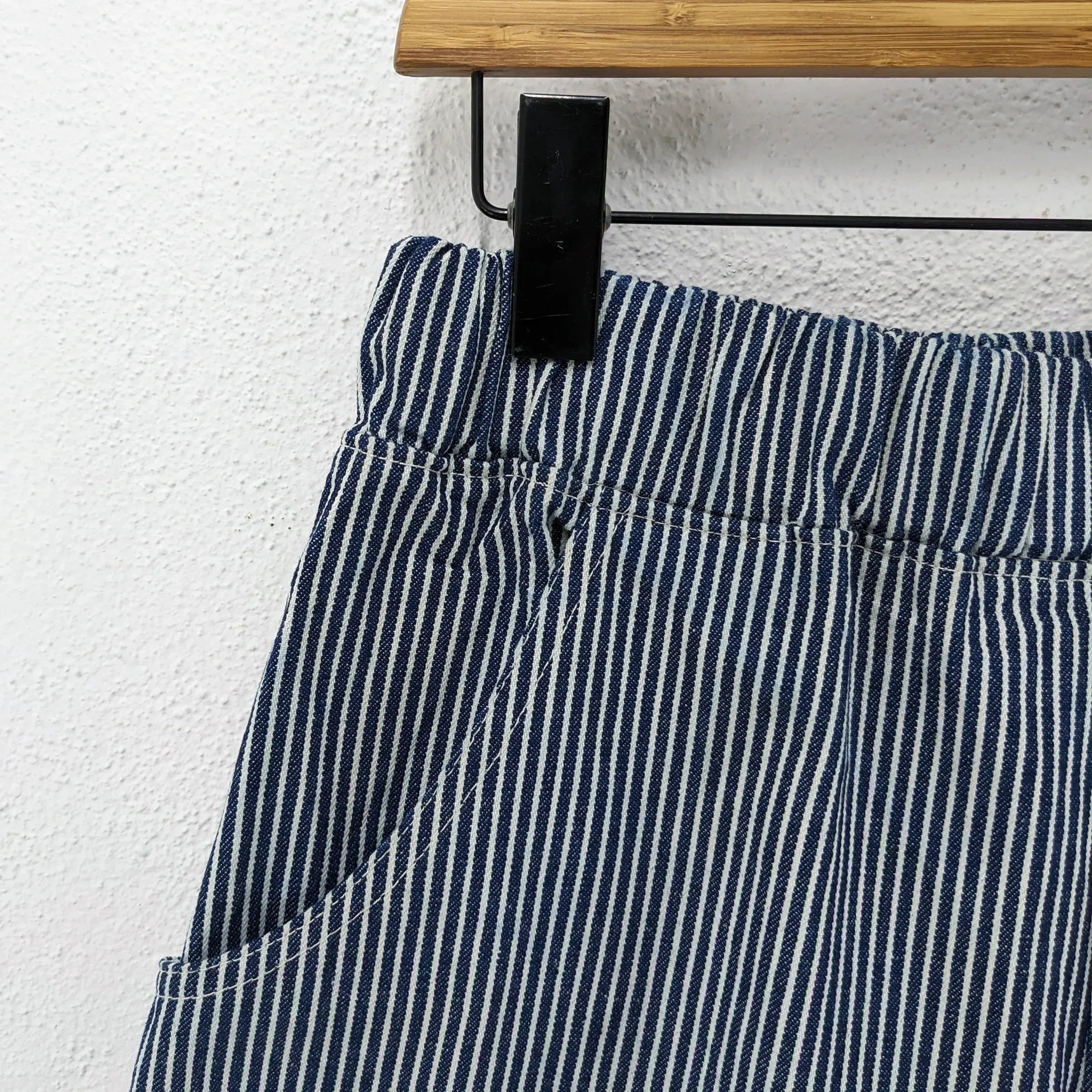 CUB Alia Long Shorts, indigo engineer stripe — available at Norwood