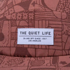 The Quiet Life Lorin Brown 5 Panel Camper Hat, rust — available at Norwood